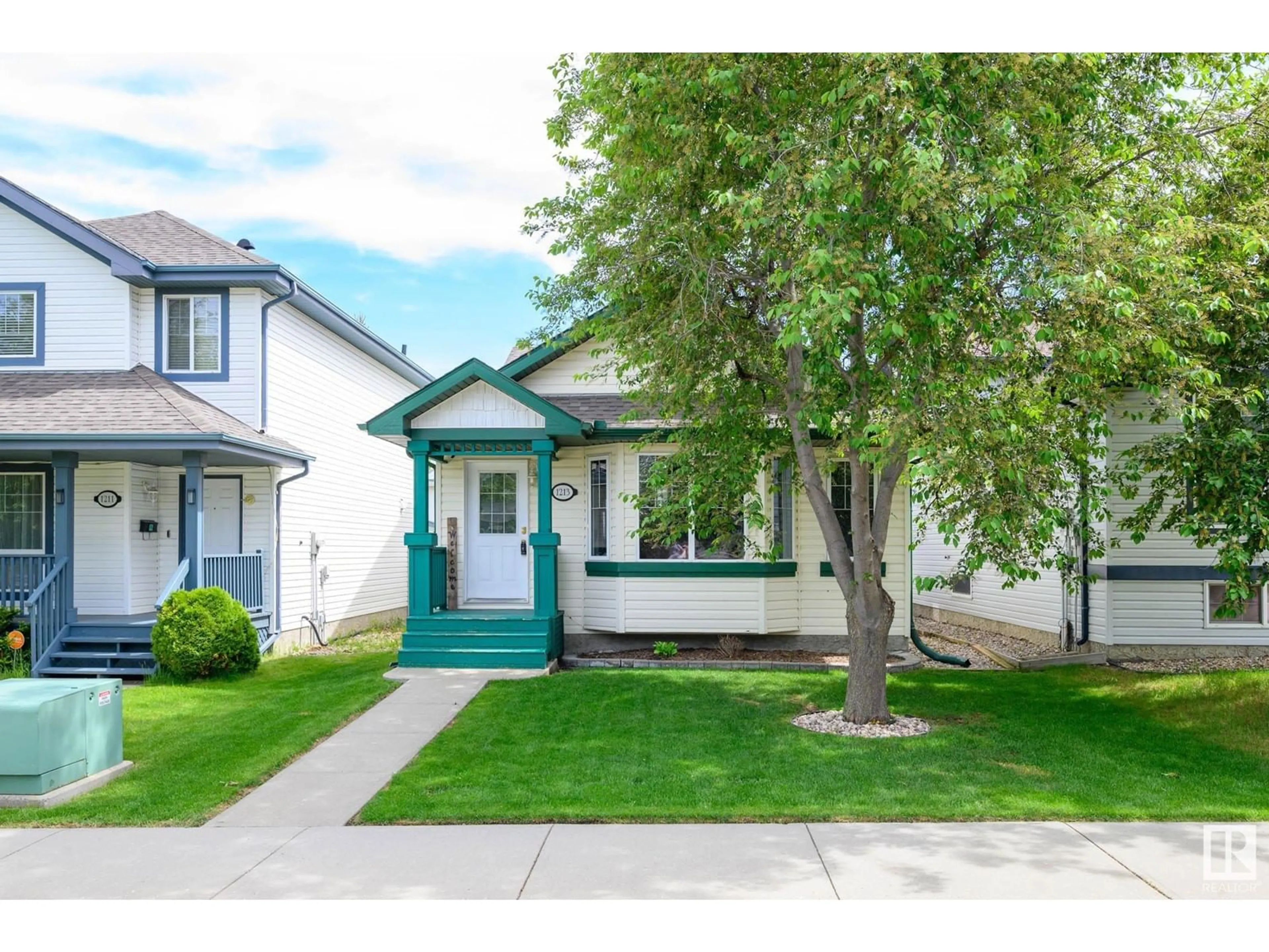 Home with vinyl exterior material, street for 1213 GILLESPIE CR, Edmonton Alberta T5T6M5