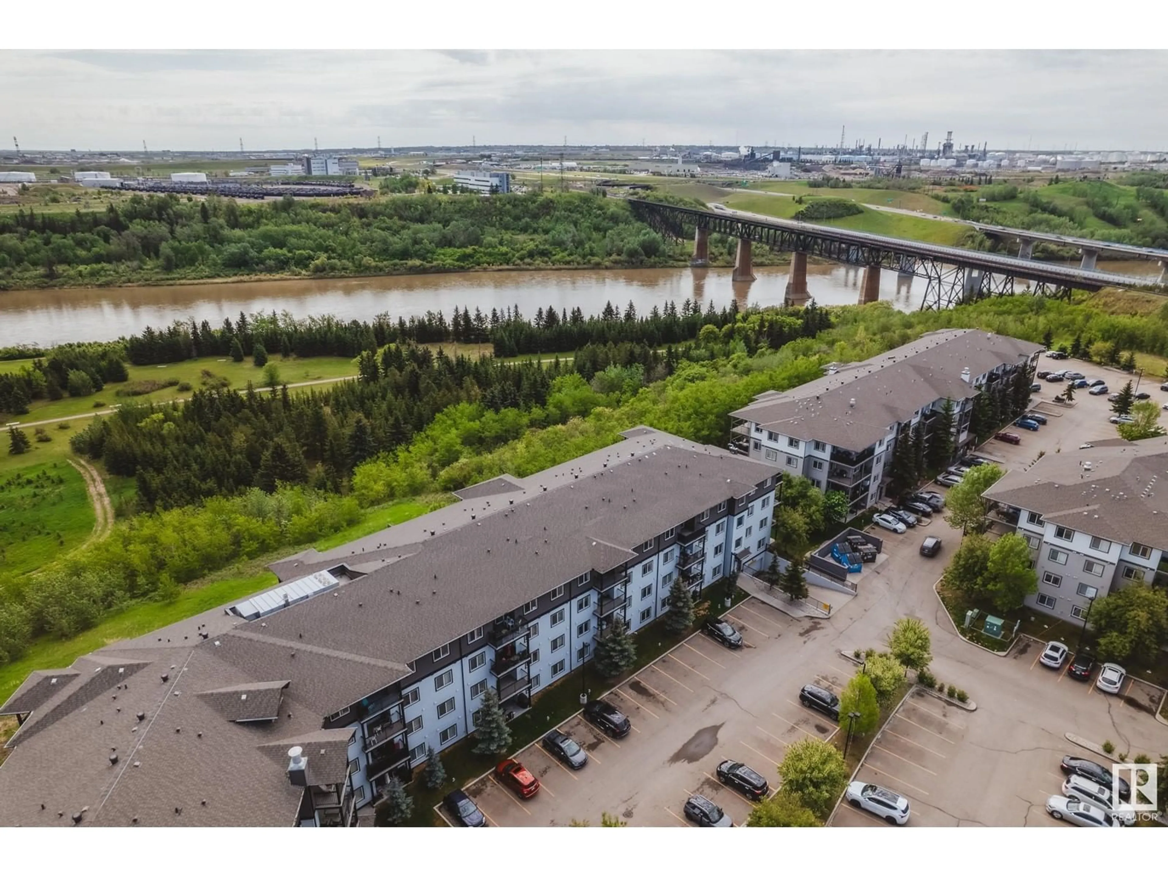 A pic from outside/outdoor area/front of a property/back of a property/a pic from drone, water/lake/river/ocean view for NW - 266 1196 HYNDMAN RD, Edmonton Alberta T5A0P8