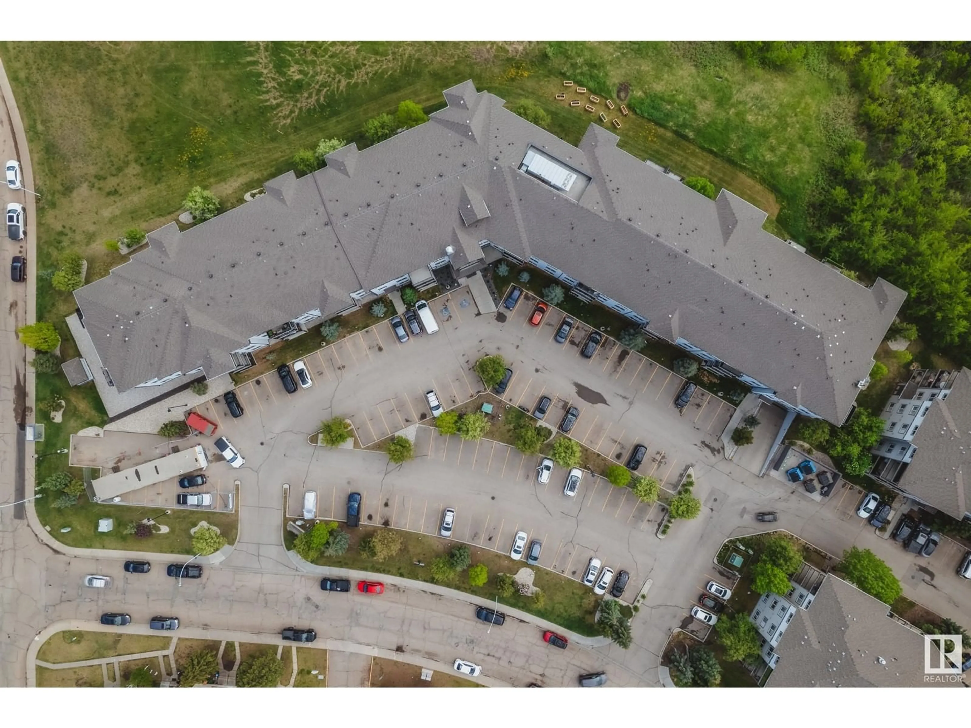 A pic from outside/outdoor area/front of a property/back of a property/a pic from drone, unknown for NW - 266 1196 HYNDMAN RD, Edmonton Alberta T5A0P8
