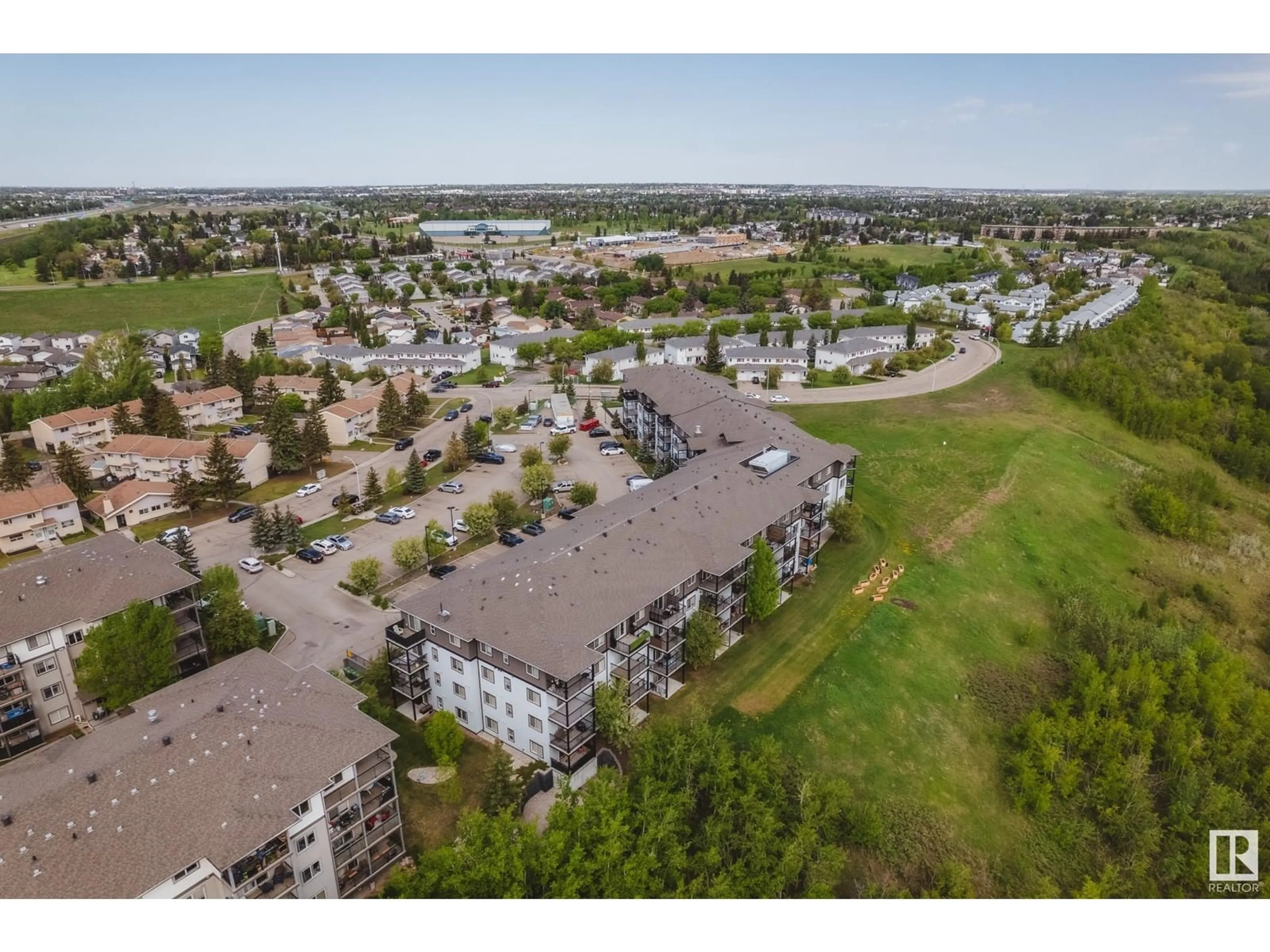 A pic from outside/outdoor area/front of a property/back of a property/a pic from drone, unknown for NW - 266 1196 HYNDMAN RD, Edmonton Alberta T5A0P8
