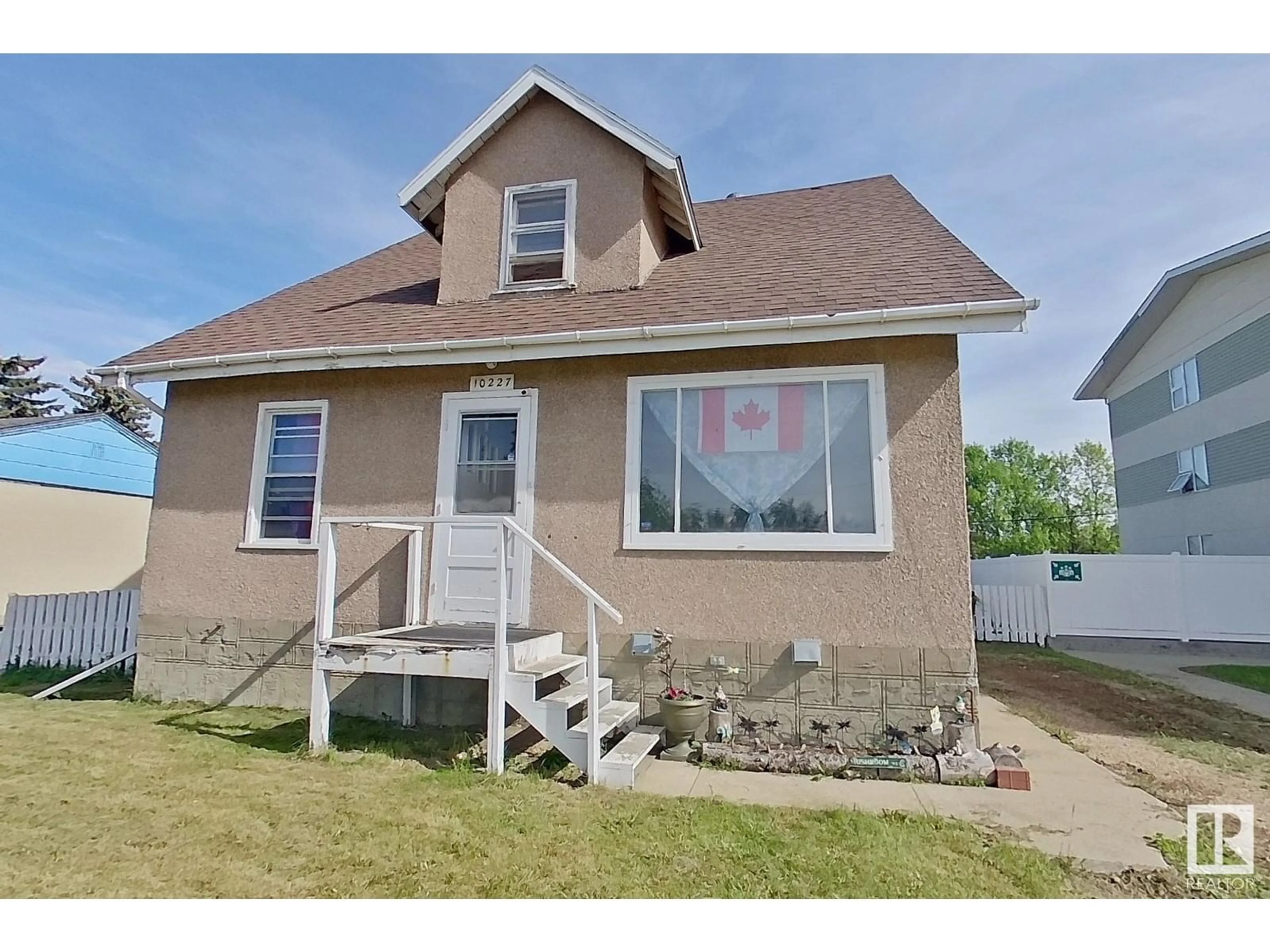 Home with vinyl exterior material, street for 10227 107 ST, Westlock Alberta T7P1X1