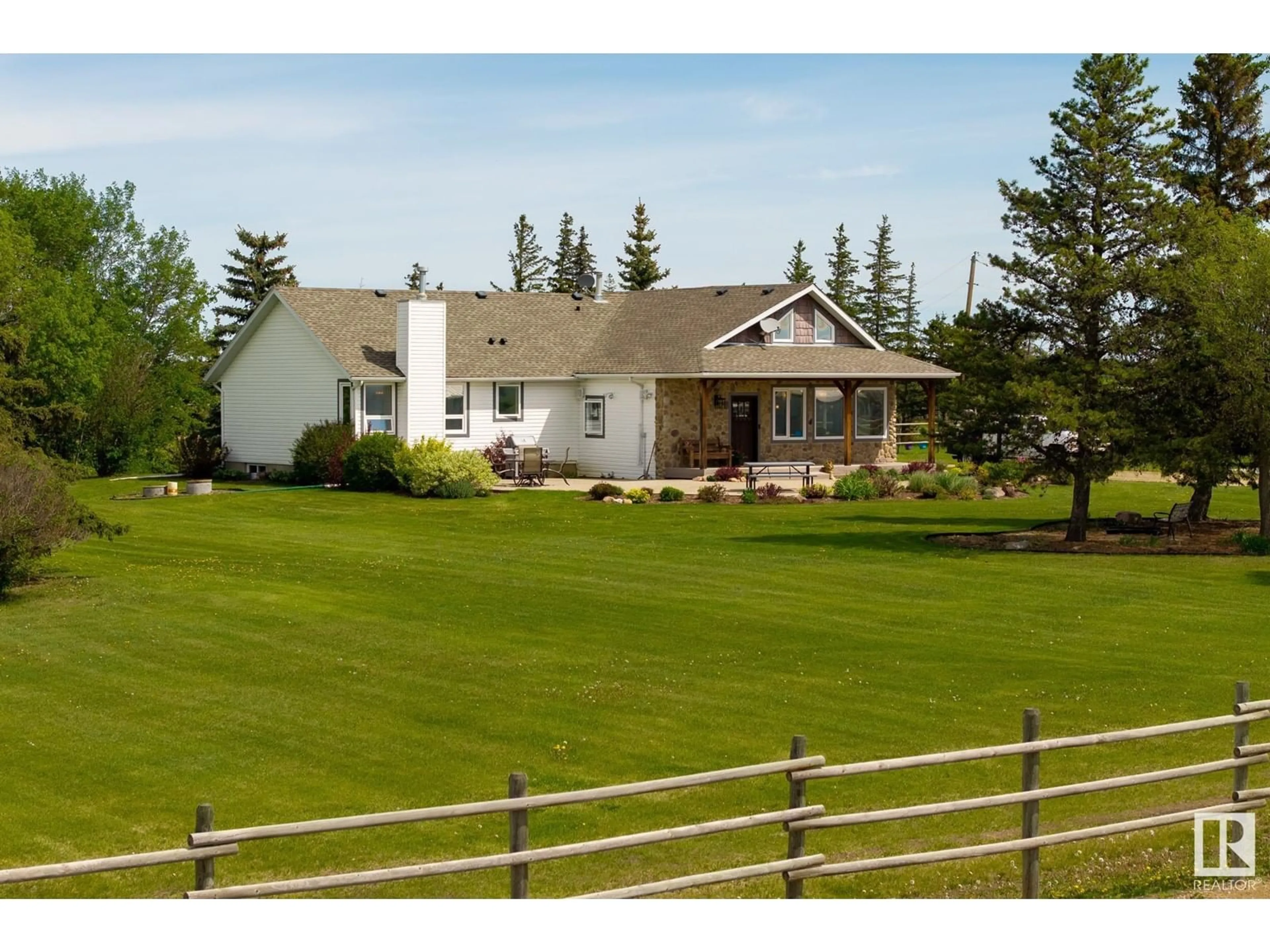 A pic from outside/outdoor area/front of a property/back of a property/a pic from drone, mountain view for 26317 TWP ROAD 552, Rural Sturgeon County Alberta T8R1T4
