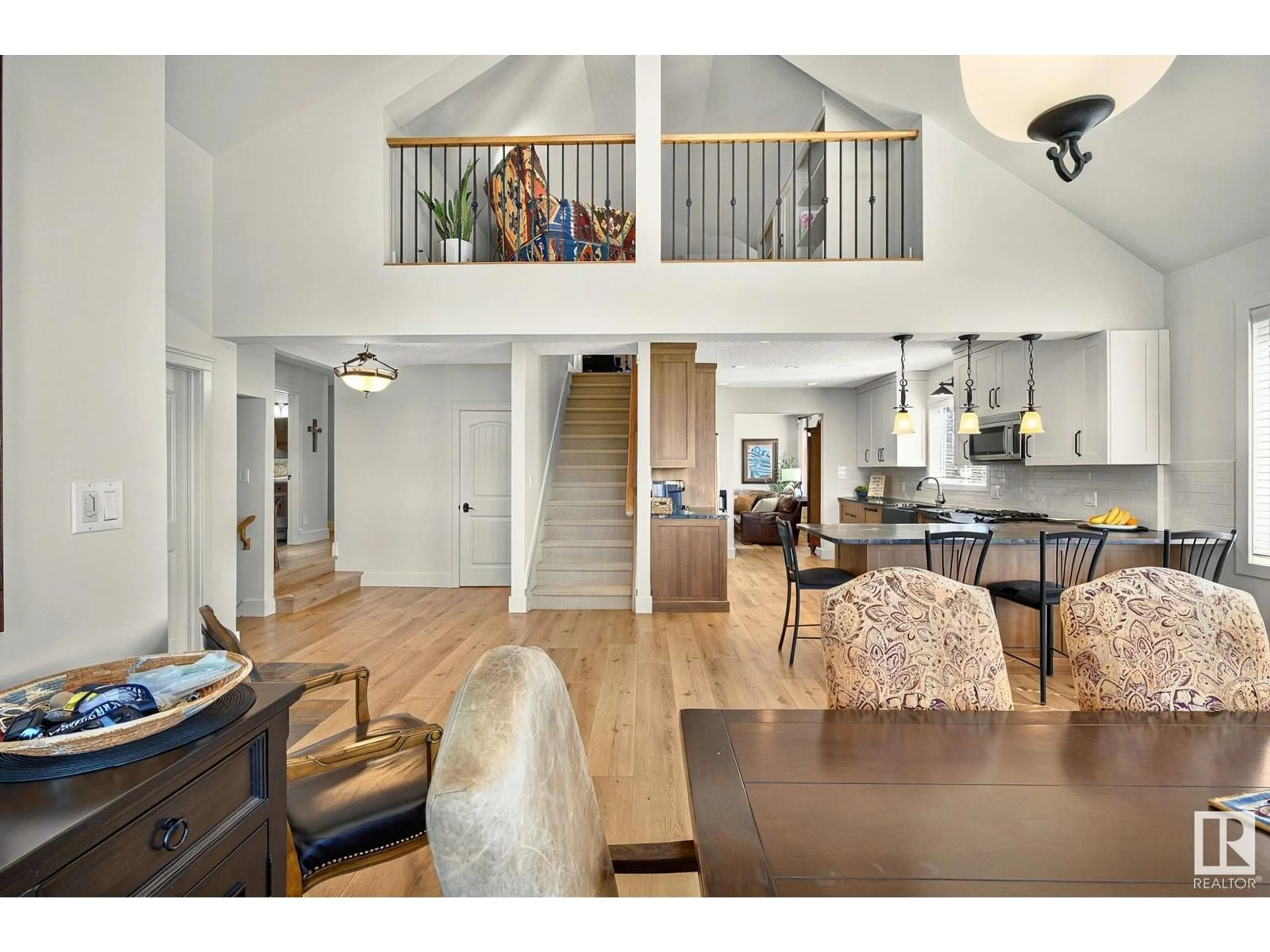 Open concept kitchen, wood/laminate floor for 26317 TWP ROAD 552, Rural Sturgeon County Alberta T8R1T4