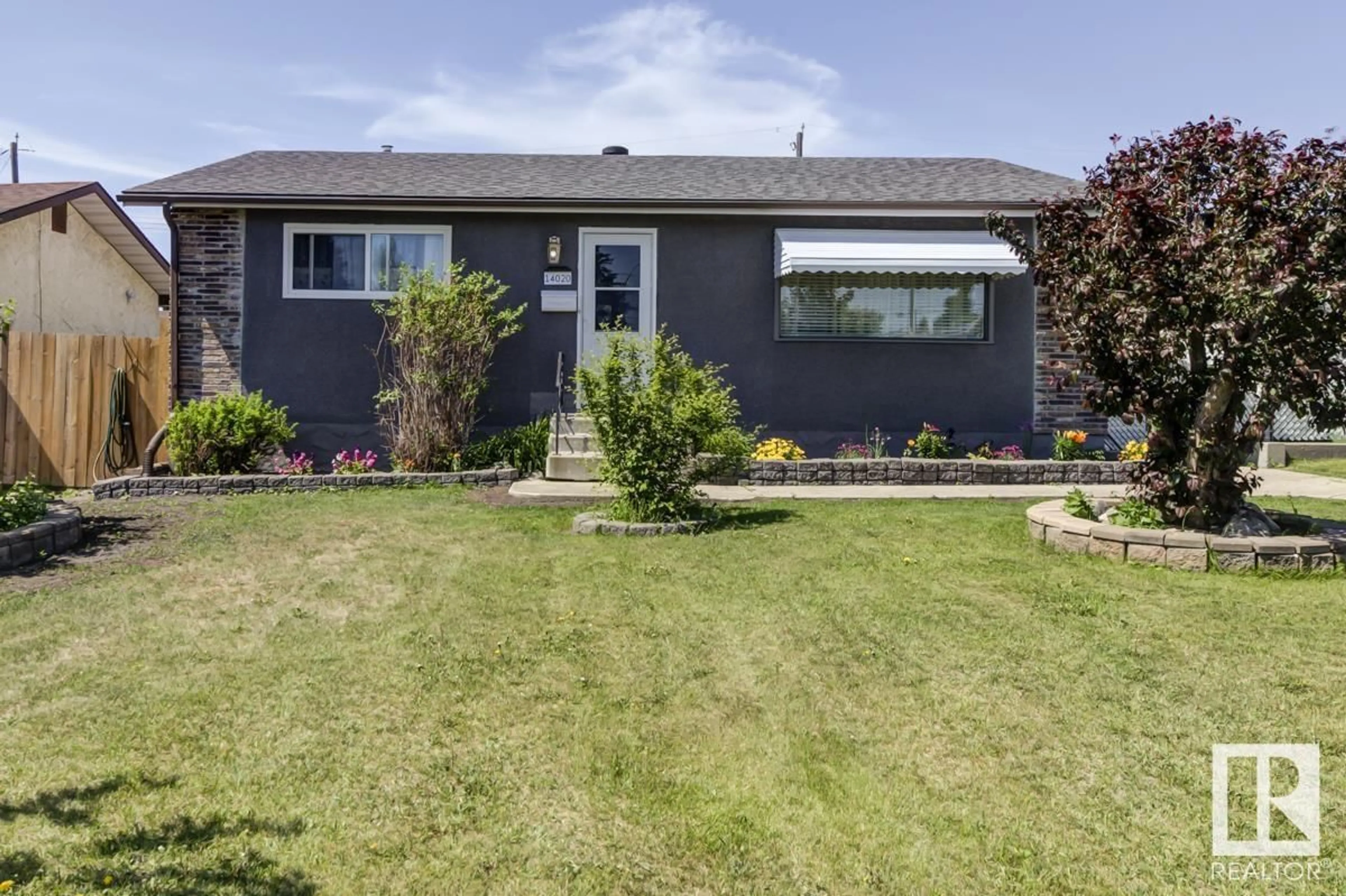Home with vinyl exterior material, street for NW - 14020 58 ST, Edmonton Alberta T5A1N4