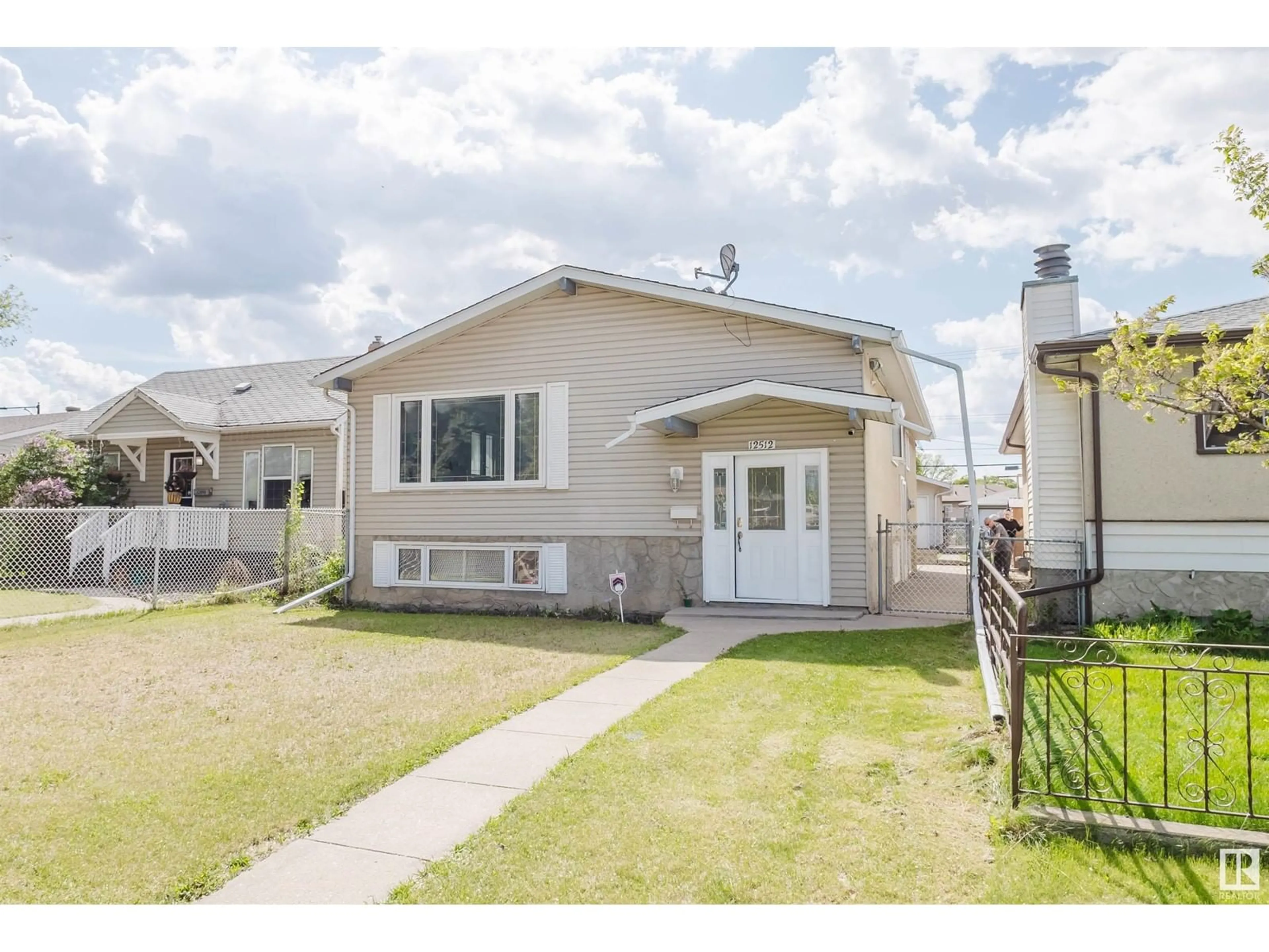 Home with vinyl exterior material, street for NW - 12512 79 ST, Edmonton Alberta T5B2M5