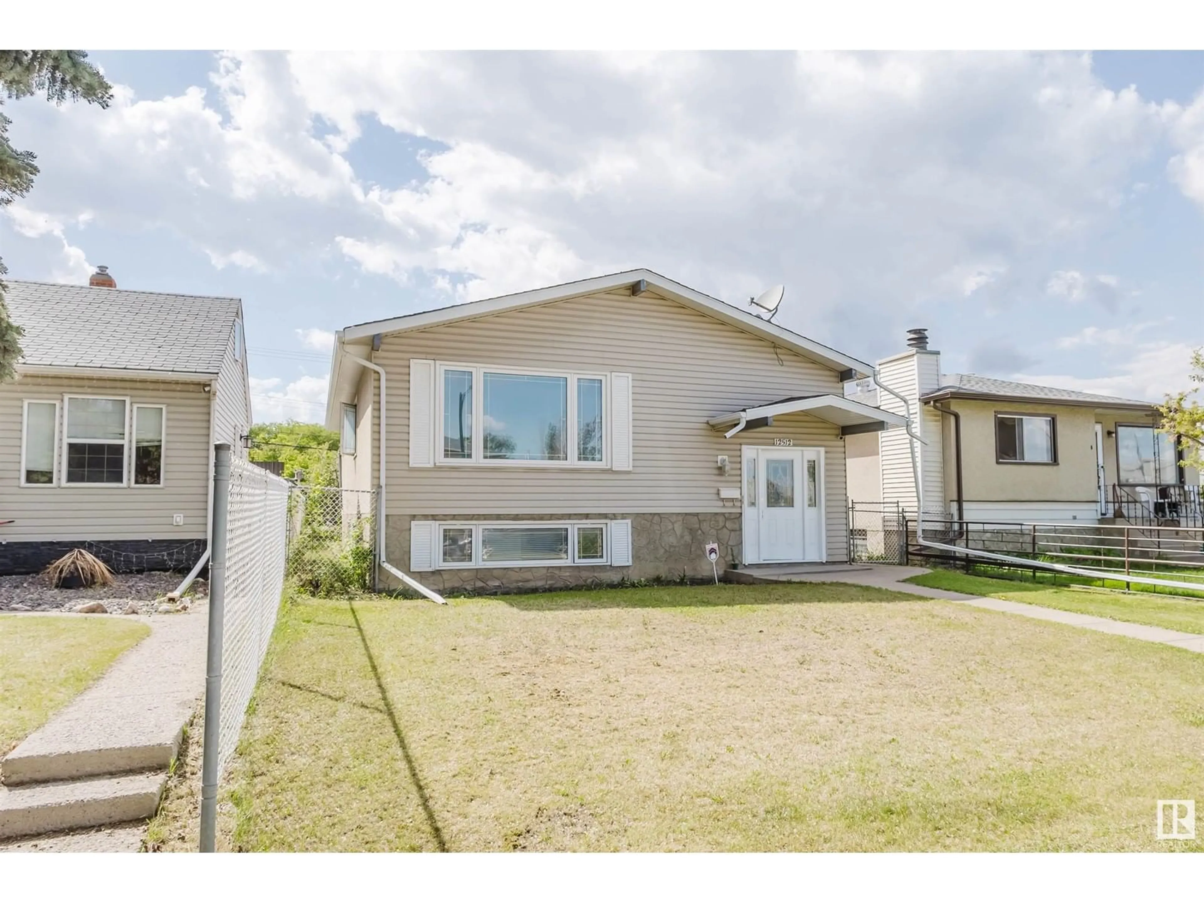 Home with vinyl exterior material, street for NW - 12512 79 ST, Edmonton Alberta T5B2M5