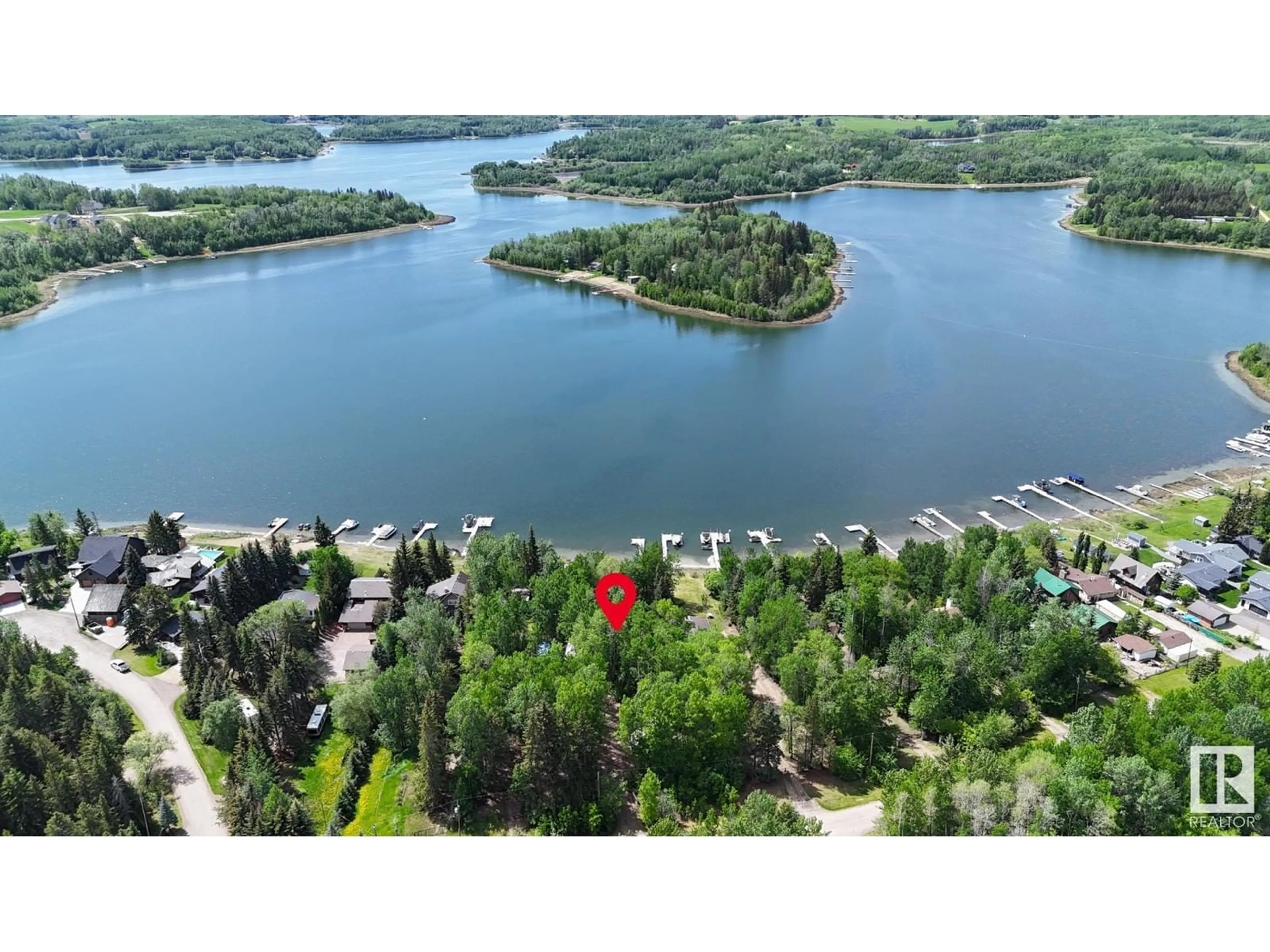 A pic from outside/outdoor area/front of a property/back of a property/a pic from drone, water/lake/river/ocean view for 37 - 2304 TWP ROAD 522, Rural Parkland County Alberta T7Y2J7
