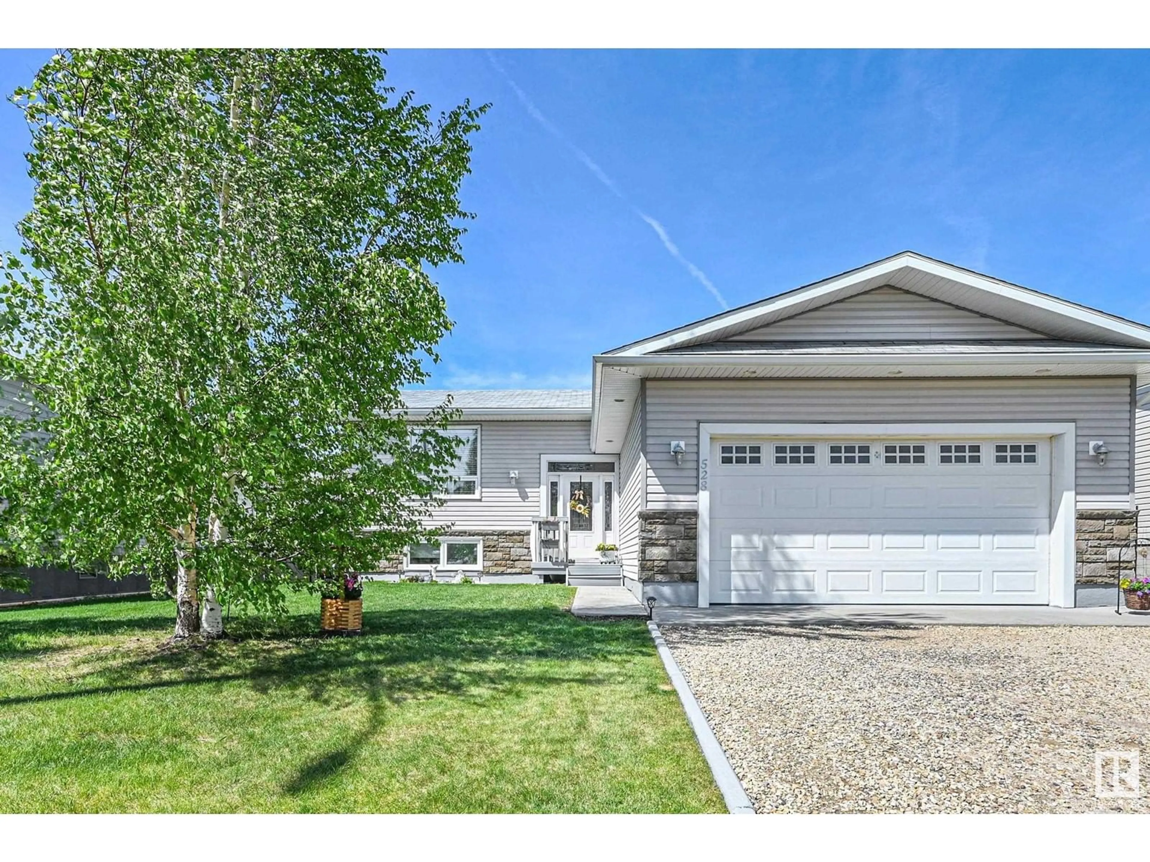 Home with vinyl exterior material, street for 528 6 ST, Thorhild Alberta T0A3J0