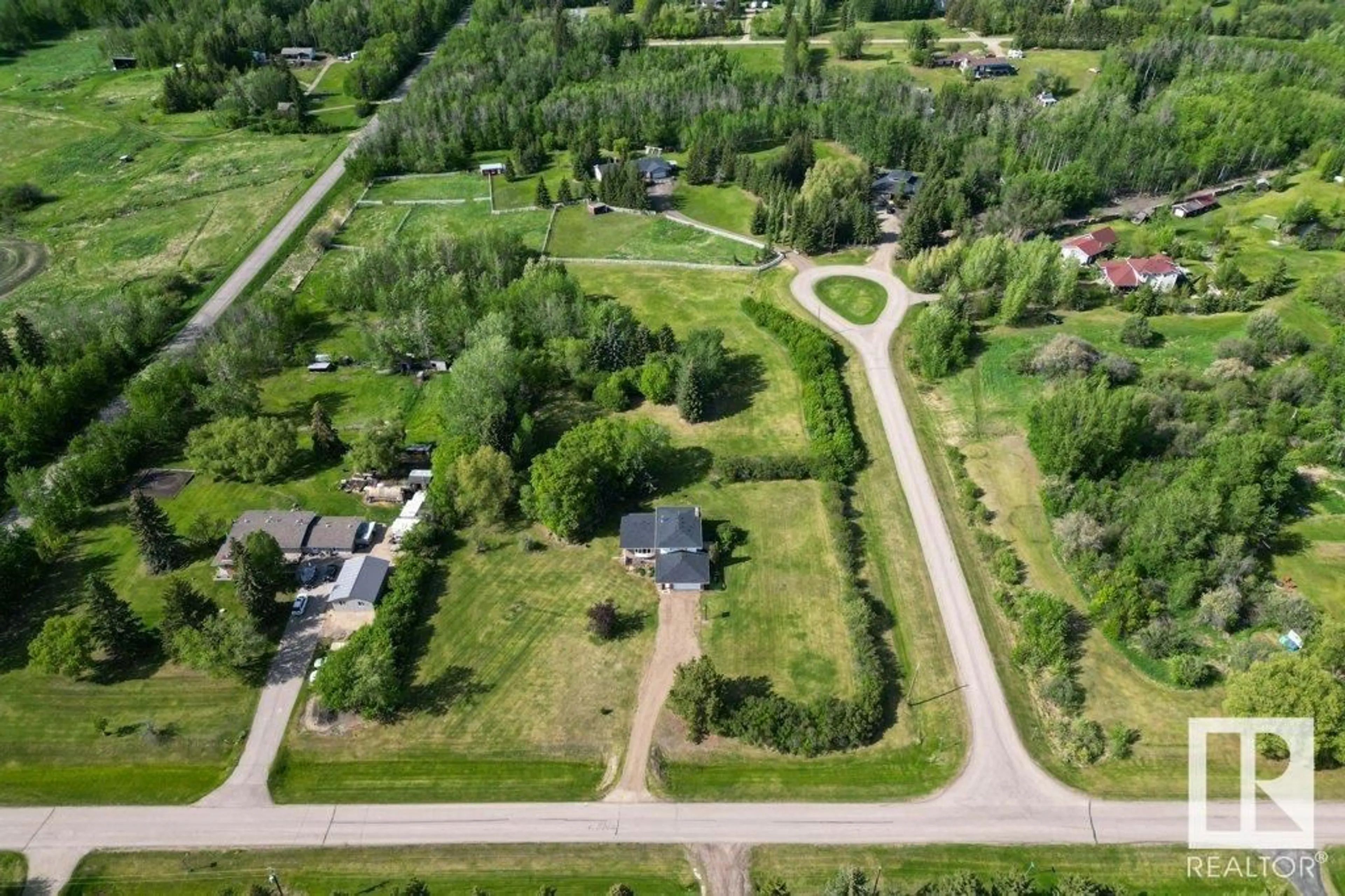 A pic from outside/outdoor area/front of a property/back of a property/a pic from drone, street for 14 - 53111 RGE ROAD 220, Rural Strathcona County Alberta T8E2C6