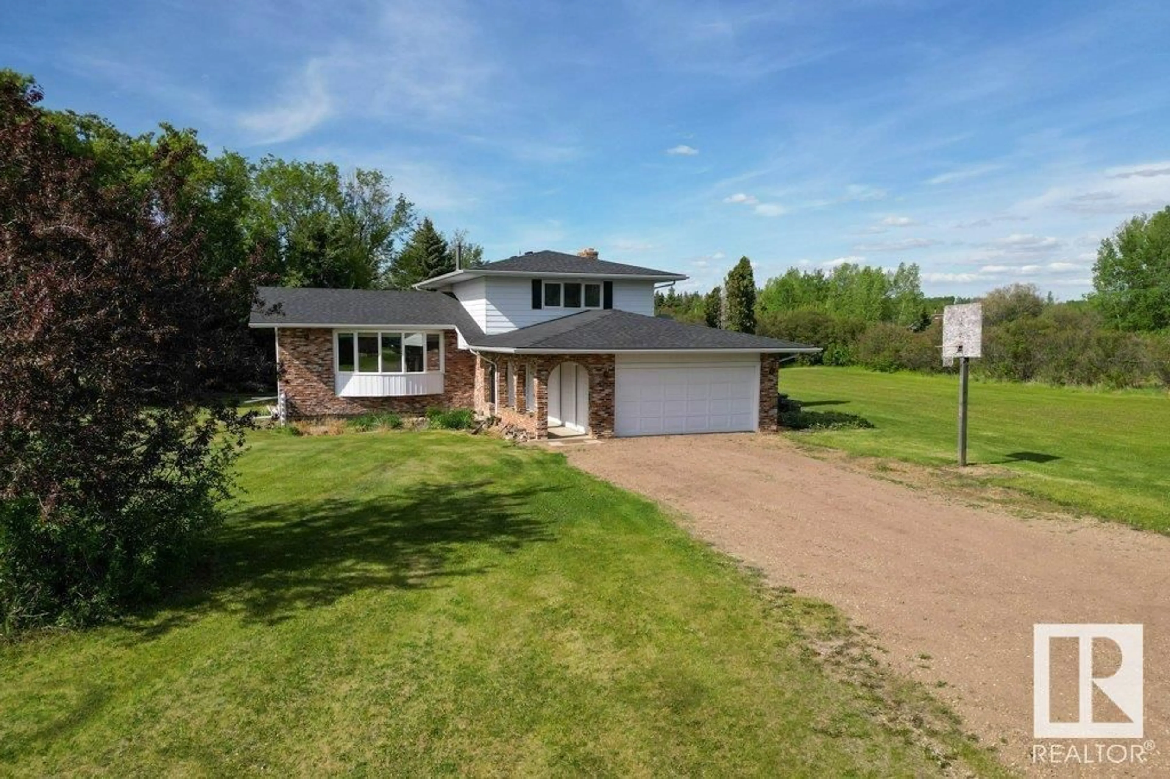 A pic from outside/outdoor area/front of a property/back of a property/a pic from drone, street for 14 - 53111 RGE ROAD 220, Rural Strathcona County Alberta T8E2C6