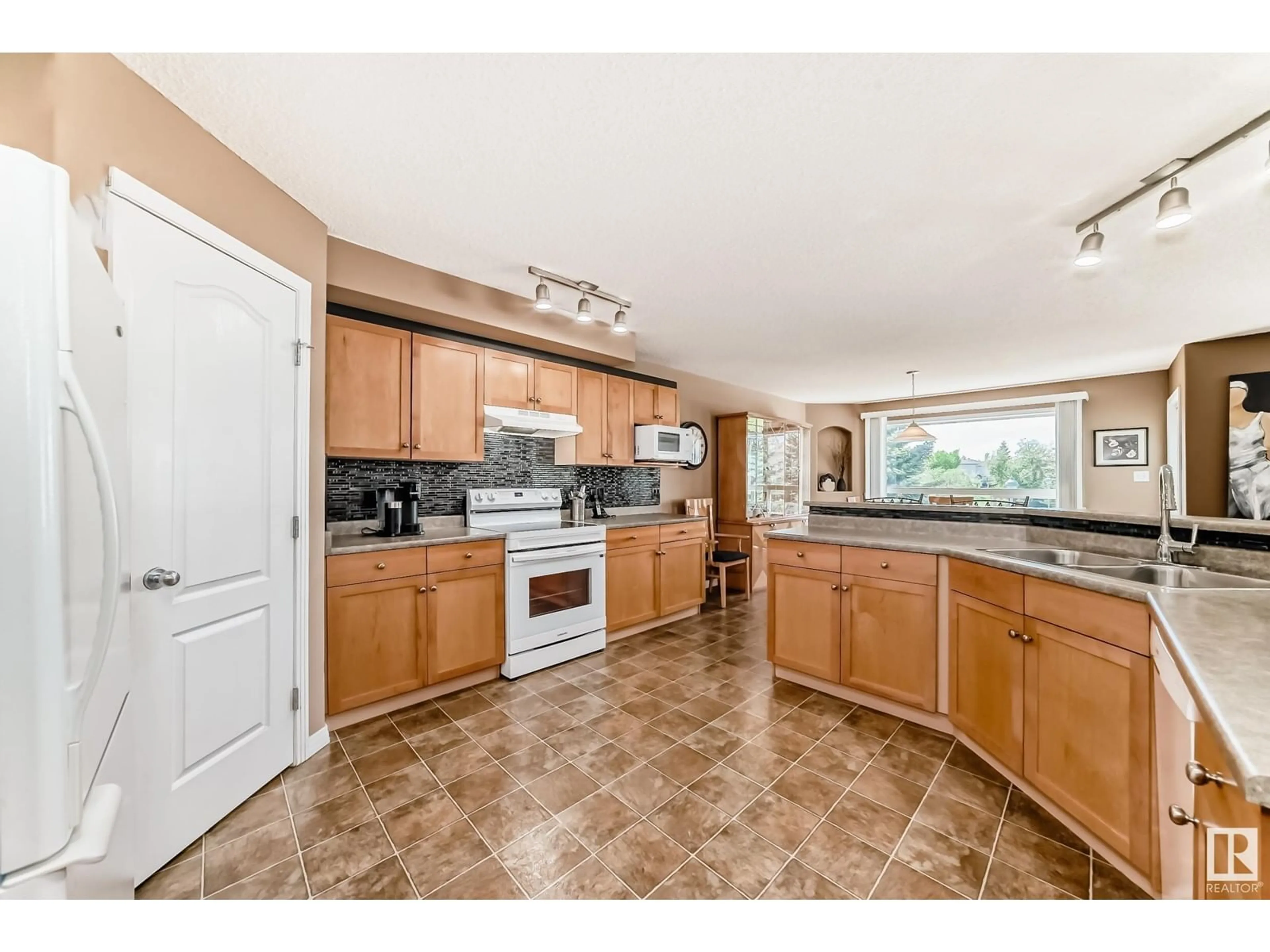 Open concept kitchen, ceramic/tile floor for 1965 GARNETT WY, Edmonton Alberta T5T6T5