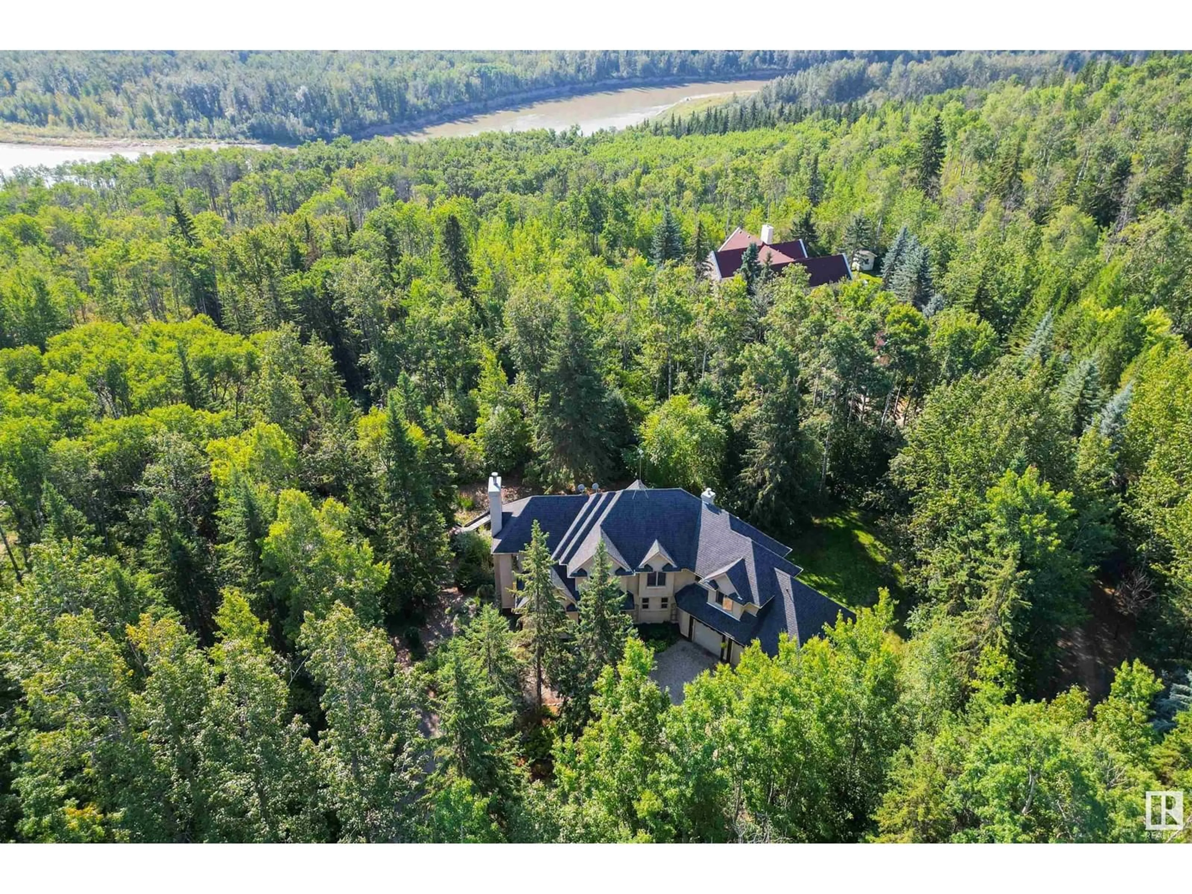 A pic from outside/outdoor area/front of a property/back of a property/a pic from drone, forest/trees view for 27107 TWP ROAD 510, Rural Parkland County Alberta T7Y1H6