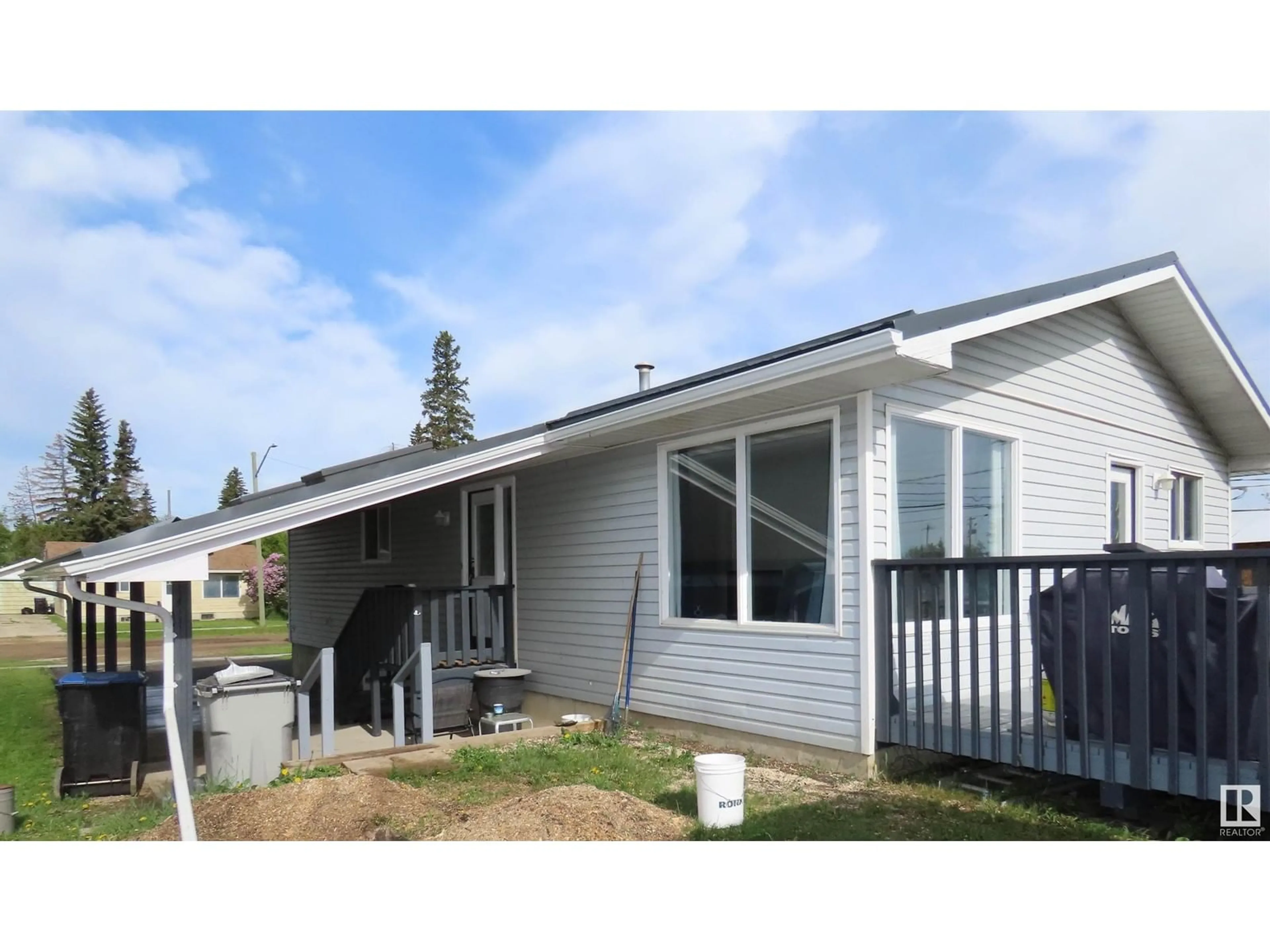 Home with vinyl exterior material, street for 4817 47 ST, Mayerthorpe Alberta T0E1N0