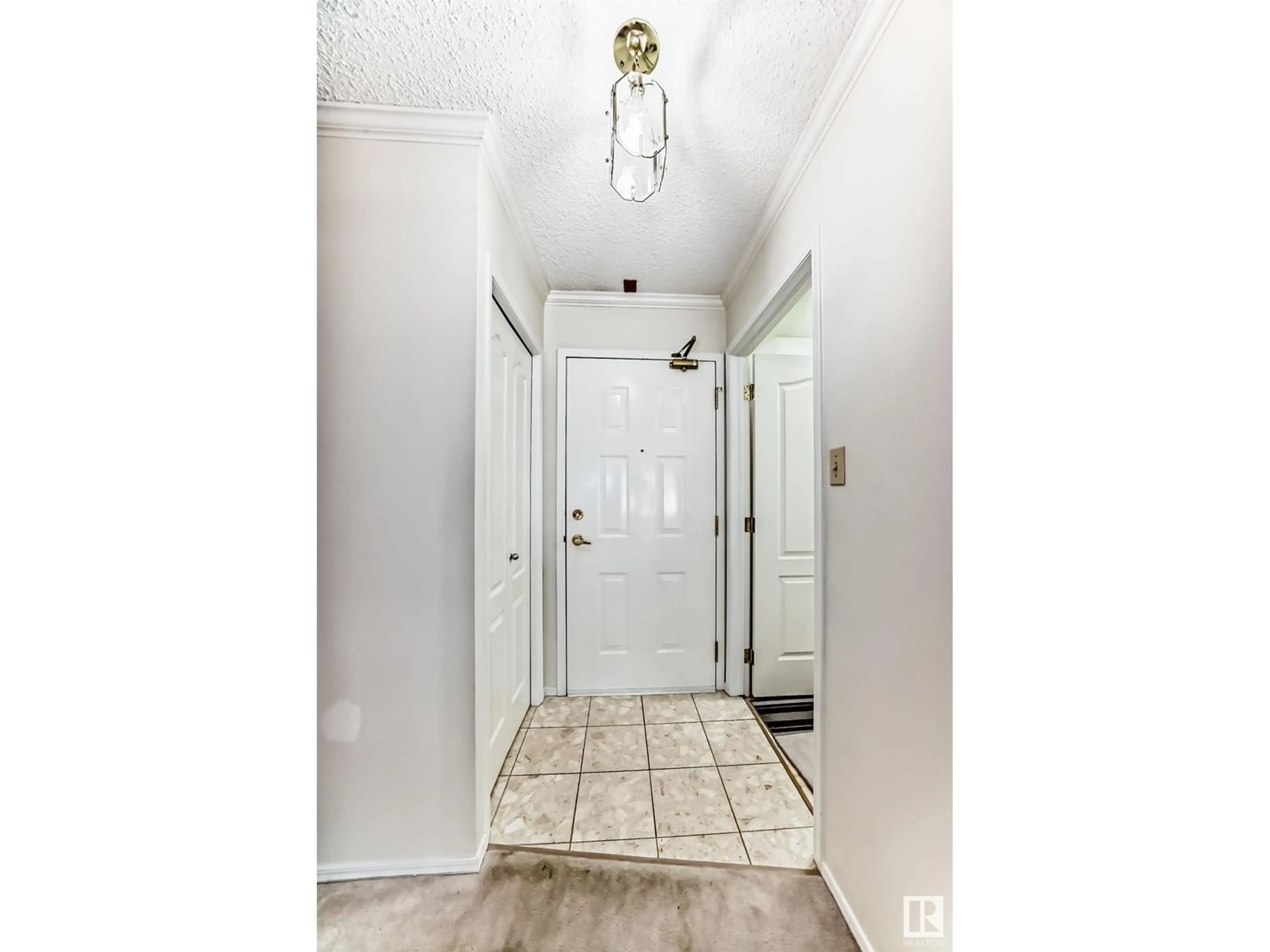 Indoor entryway for 319 - 17151 94A AV, Edmonton Alberta T5T5Z9
