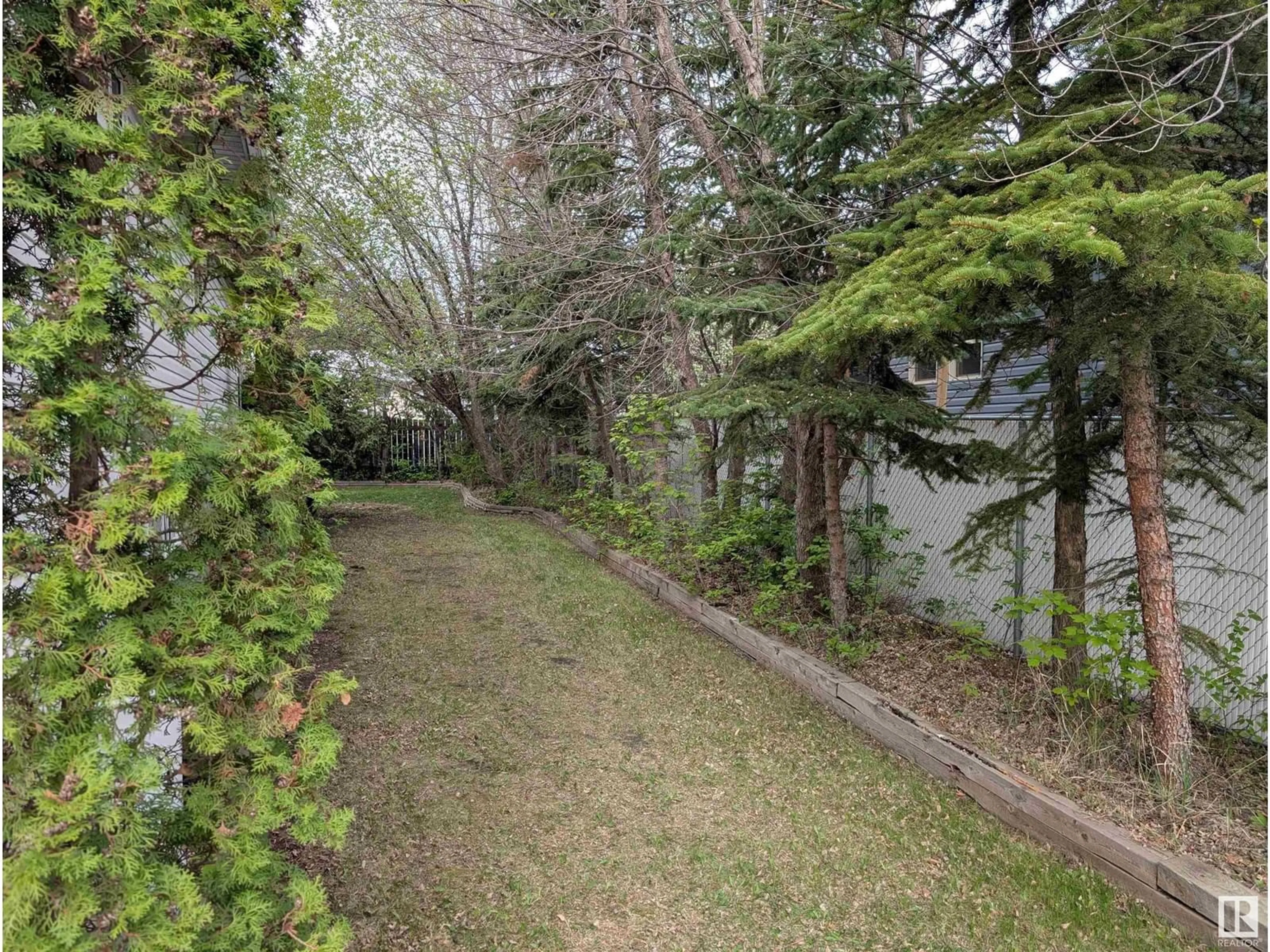 Patio, forest/trees view for 221 GRANDIN DR, Morinville Alberta T8R1H6