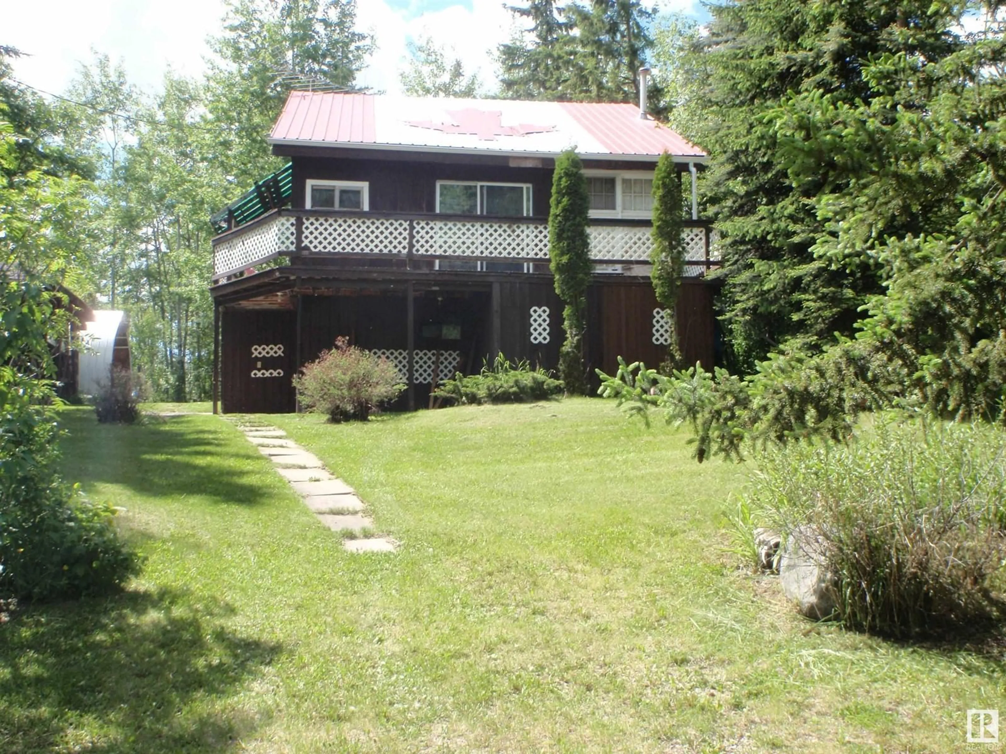 A pic from outside/outdoor area/front of a property/back of a property/a pic from drone, unknown for 154 - 5415 TWP RD 594, Rural Barrhead County Alberta T7N1N3