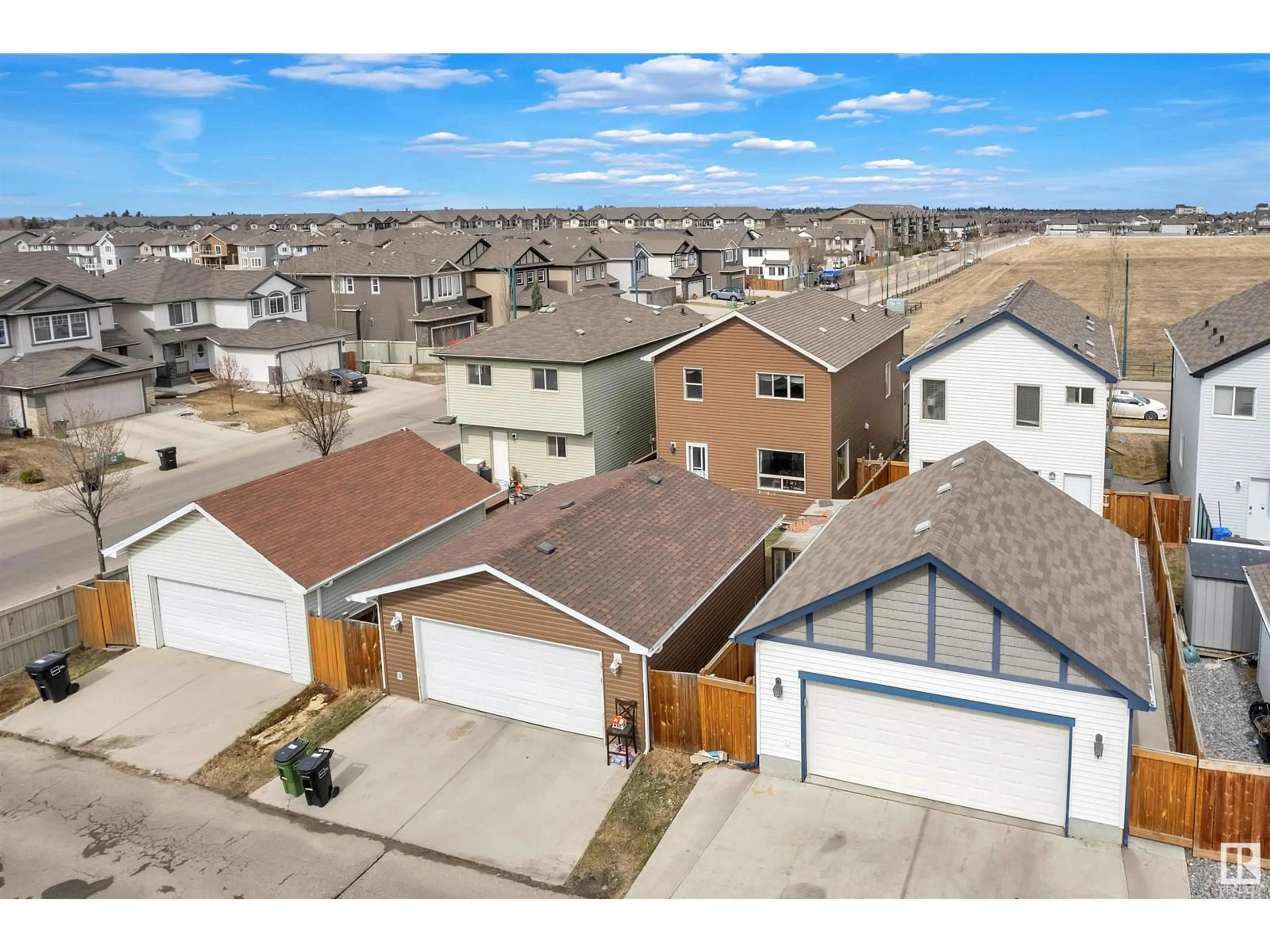 A pic from outside/outdoor area/front of a property/back of a property/a pic from drone, street for 3125 17A AV, Edmonton Alberta T6T0P5
