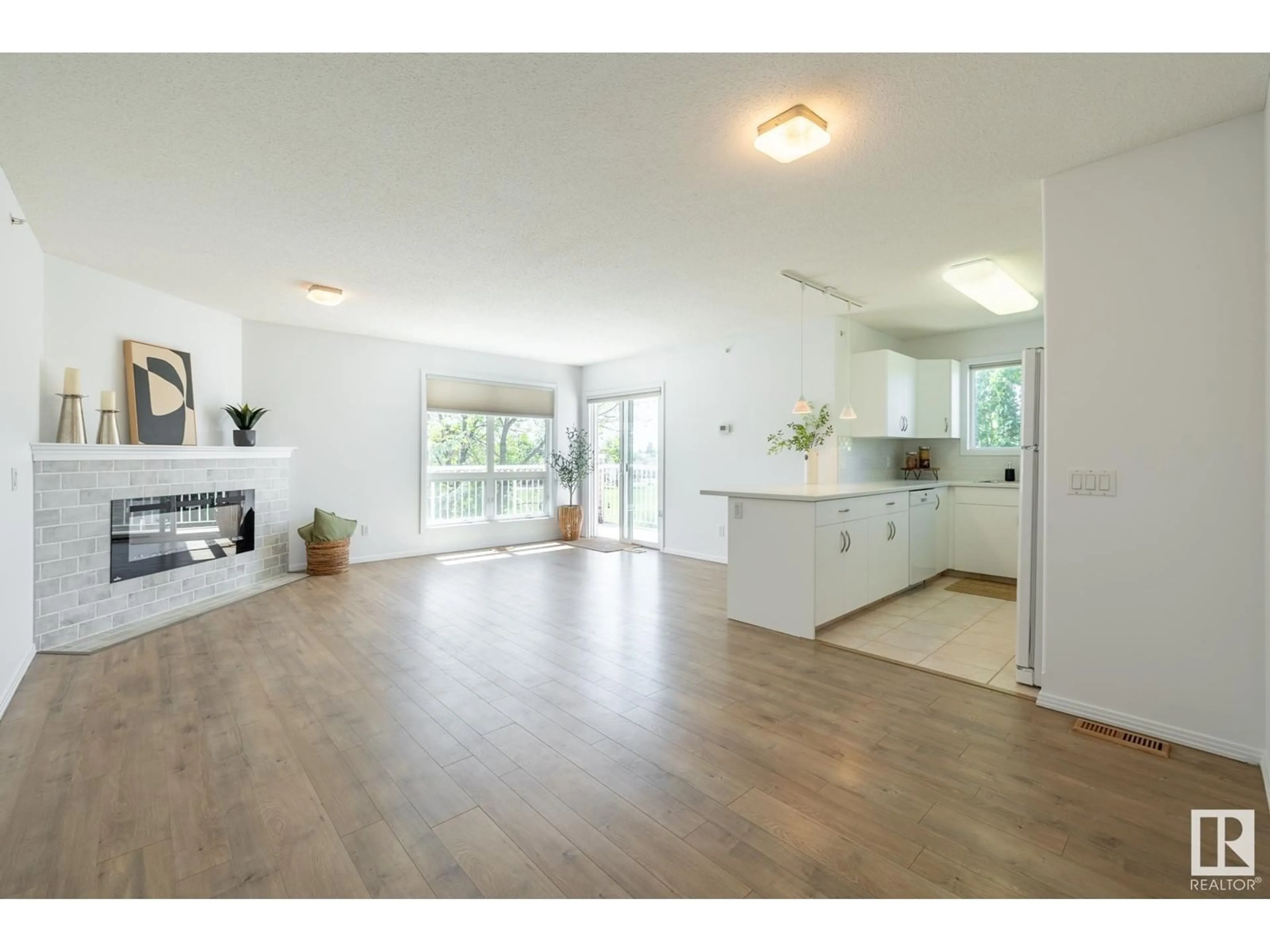 Open concept kitchen, wood/laminate floor for #402 - 10528 77 AV, Edmonton Alberta T6E1N1