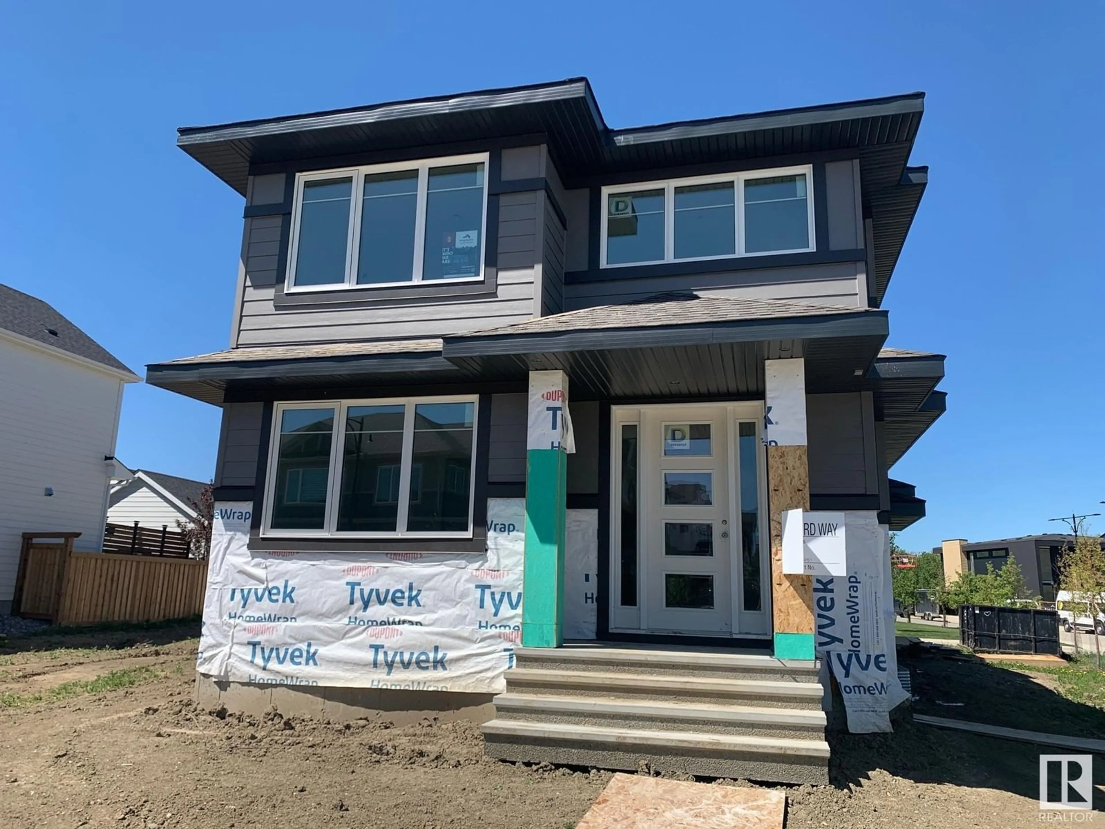 Home with vinyl exterior material, street for 6704 CRAWFORD WY, Edmonton Alberta T6W1A6
