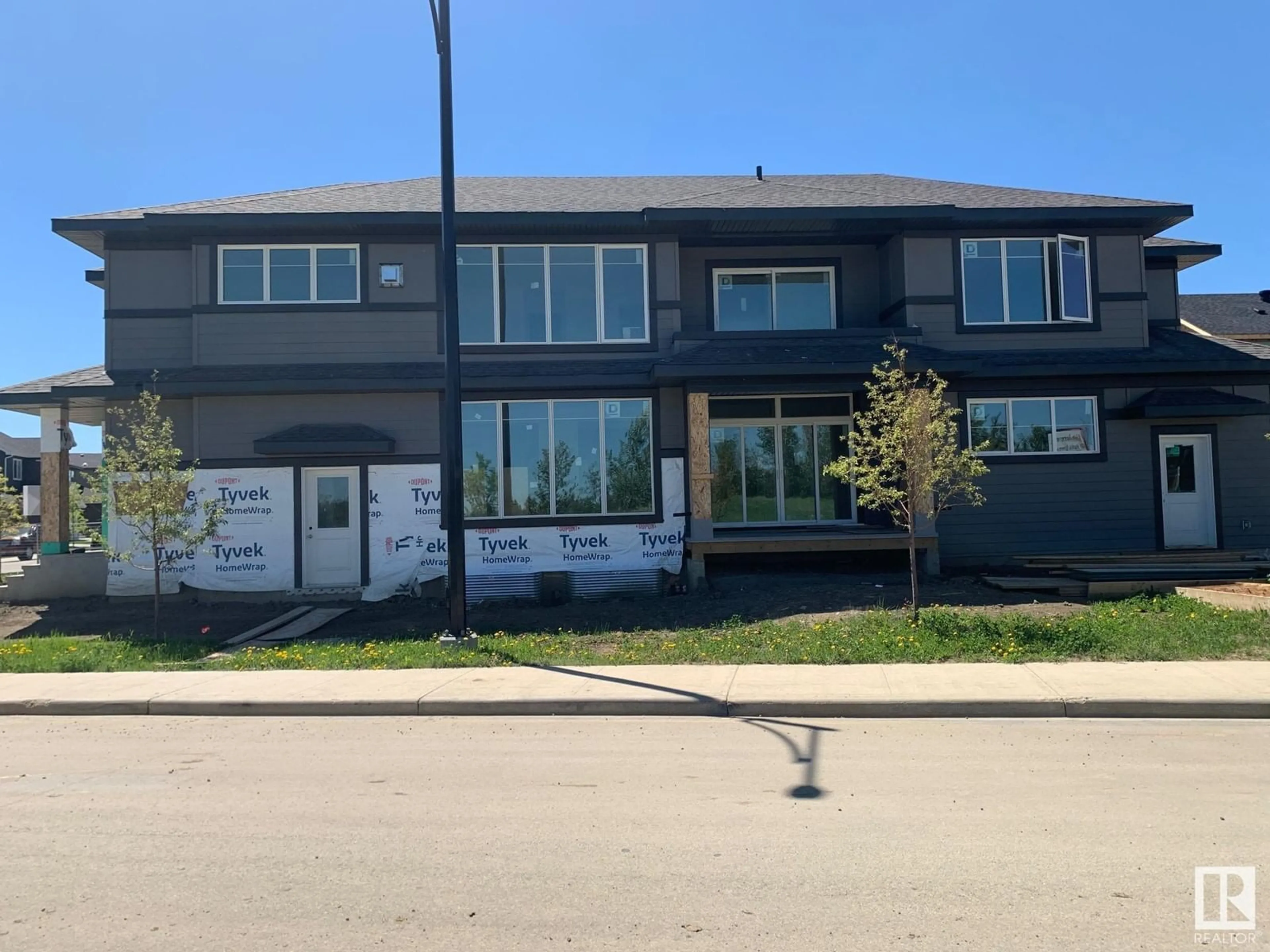 A pic from outside/outdoor area/front of a property/back of a property/a pic from drone, building for 6704 CRAWFORD WY, Edmonton Alberta T6W1A6