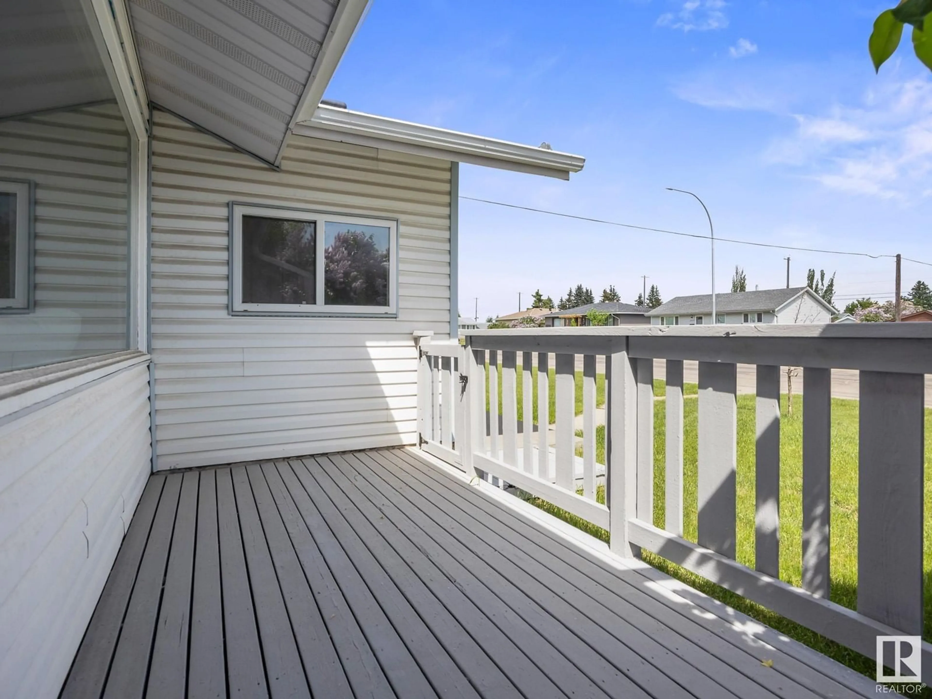 Home with vinyl exterior material, street for NW - 13316 135 ST, Edmonton Alberta T5L1V7
