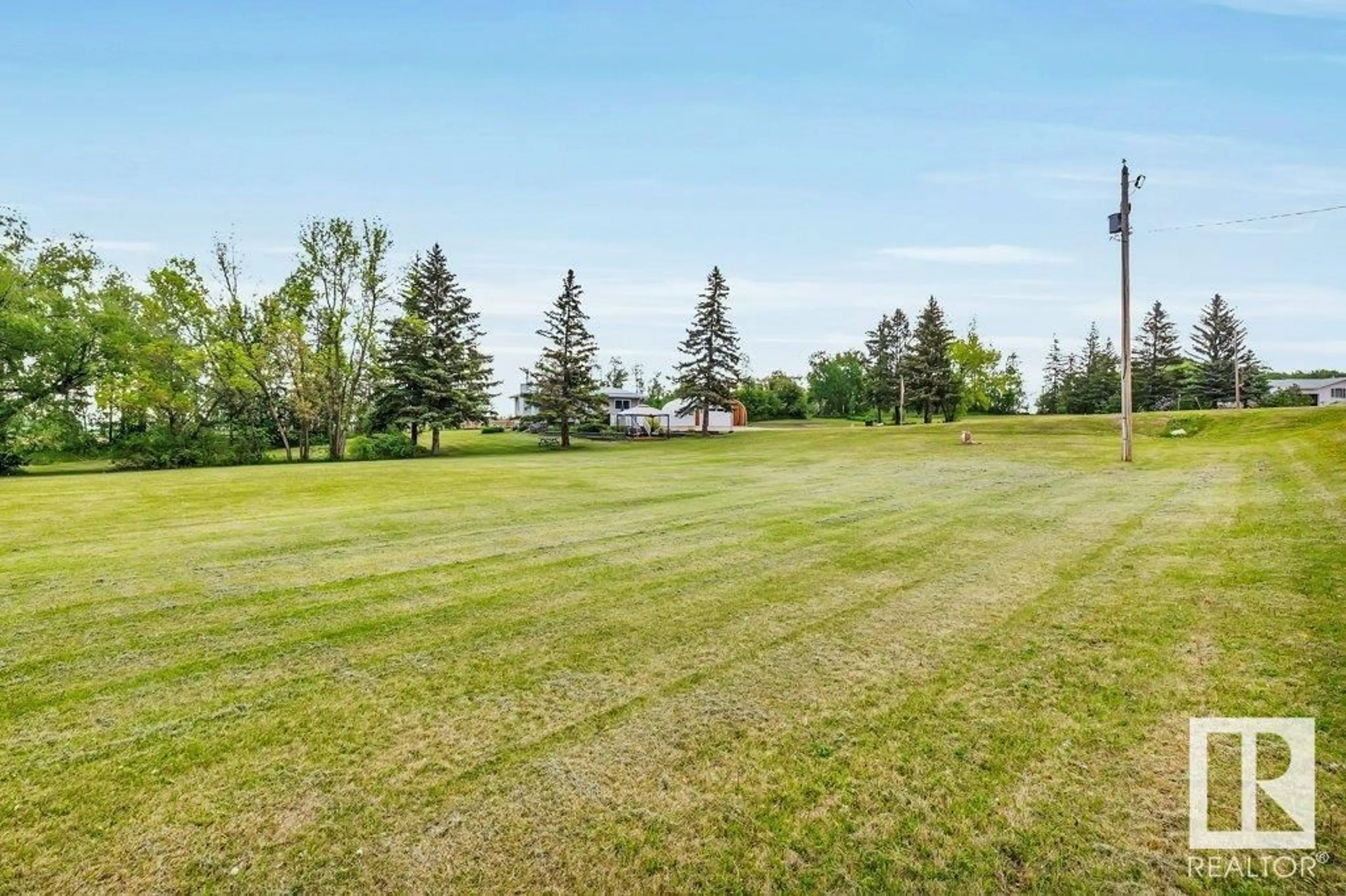 A pic from outside/outdoor area/front of a property/back of a property/a pic from drone, water/lake/river/ocean view for 104 - 2419 TWP RD 545, Rural Lac Ste. Anne County Alberta T0E1V0