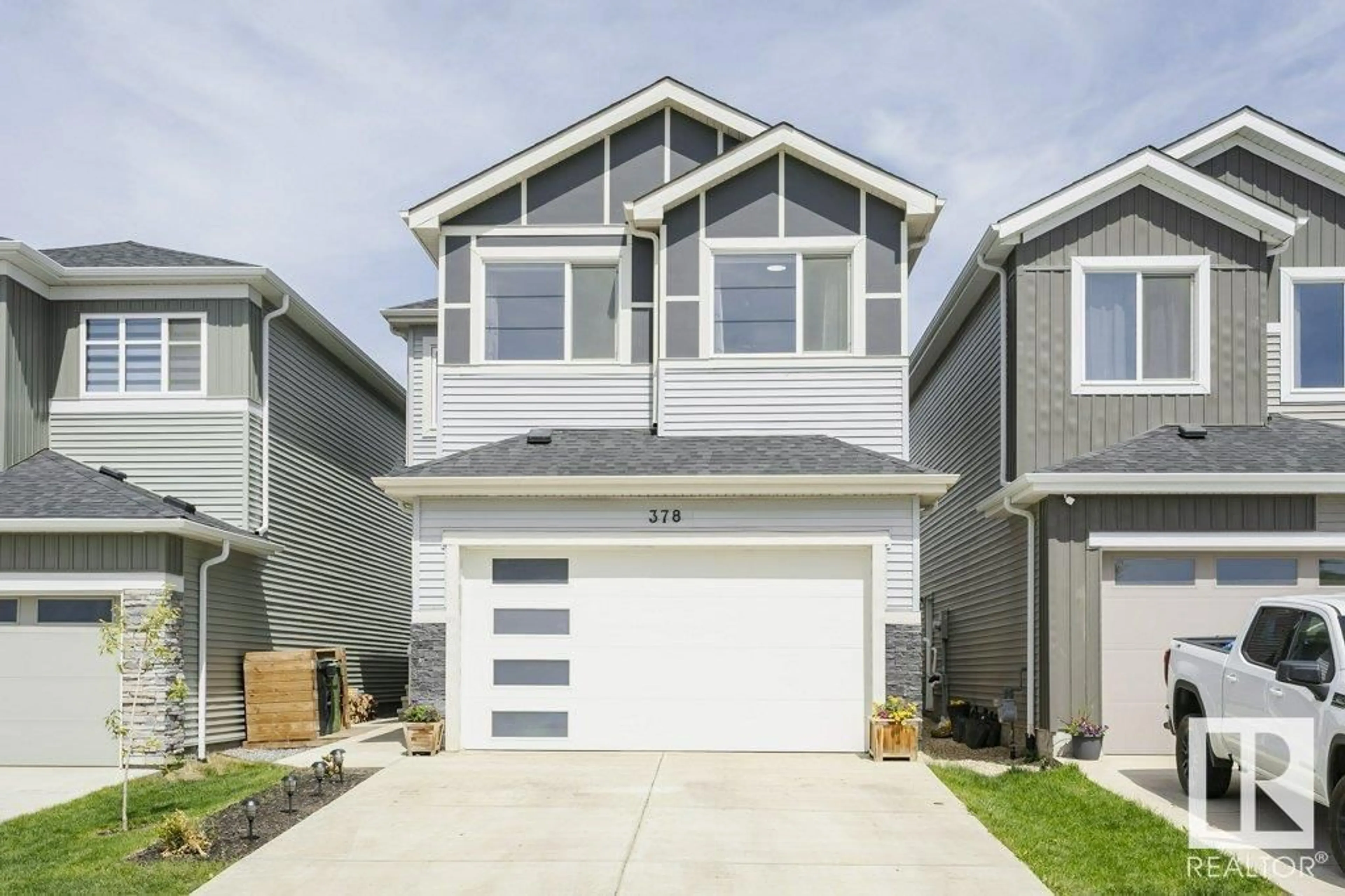 Home with vinyl exterior material, street for 378 BLUFF CV, Leduc Alberta T9E1M9