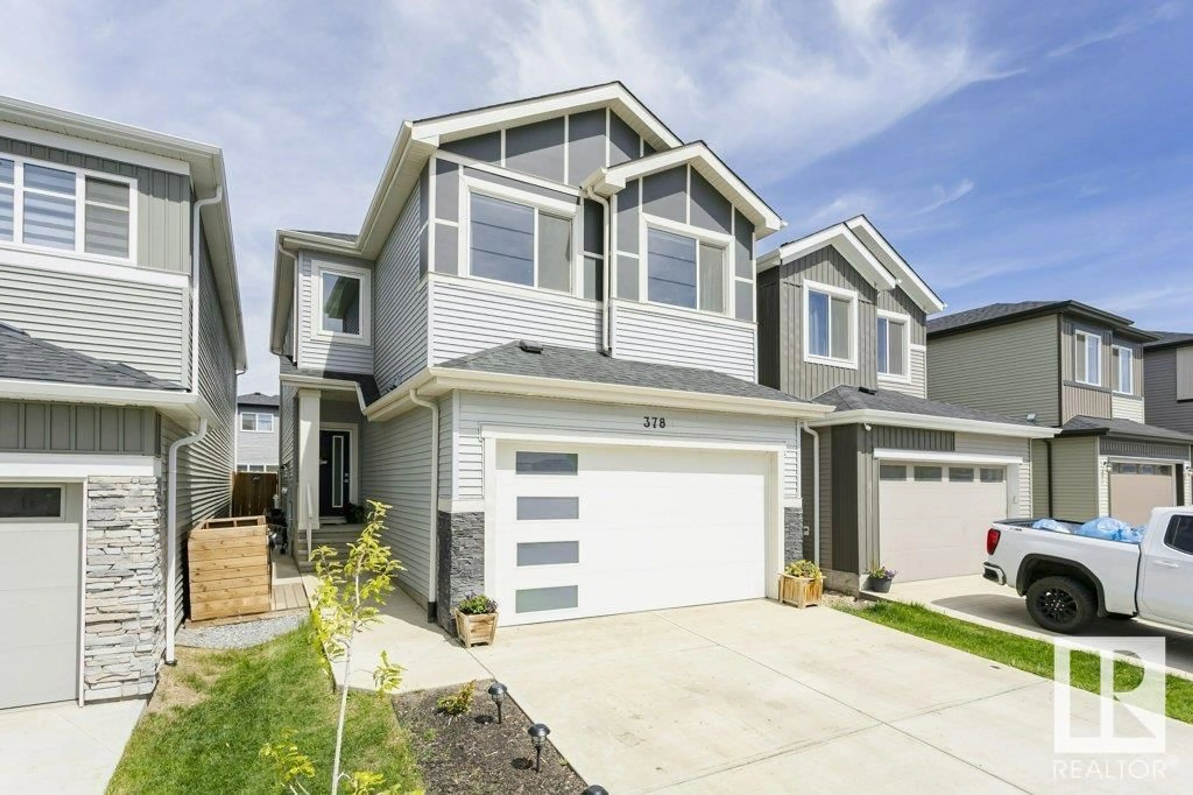 Home with vinyl exterior material, street for 378 BLUFF CV, Leduc Alberta T9E1M9