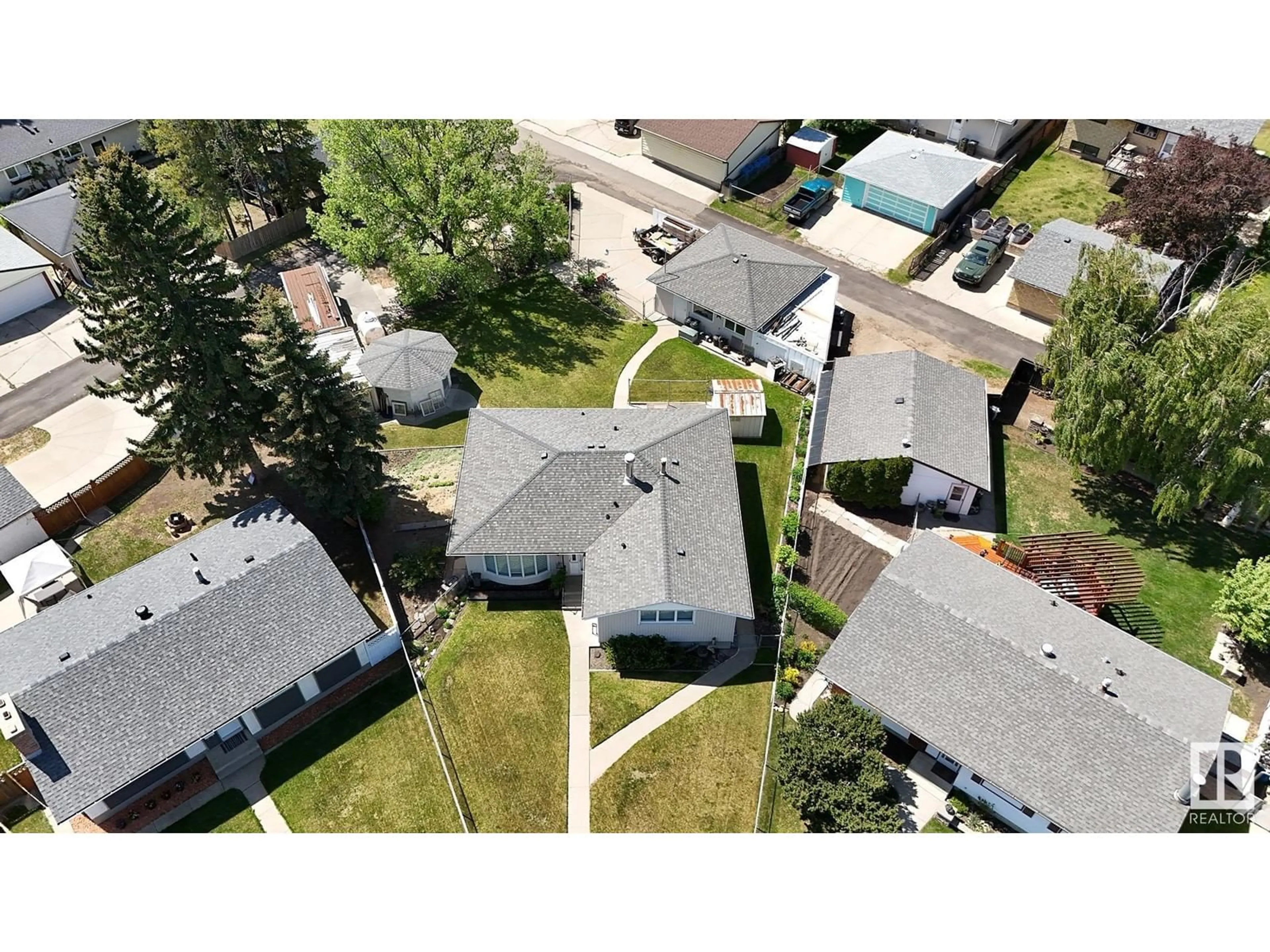 A pic from outside/outdoor area/front of a property/back of a property/a pic from drone, street for 3231 112 AV, Edmonton Alberta T5W0M1