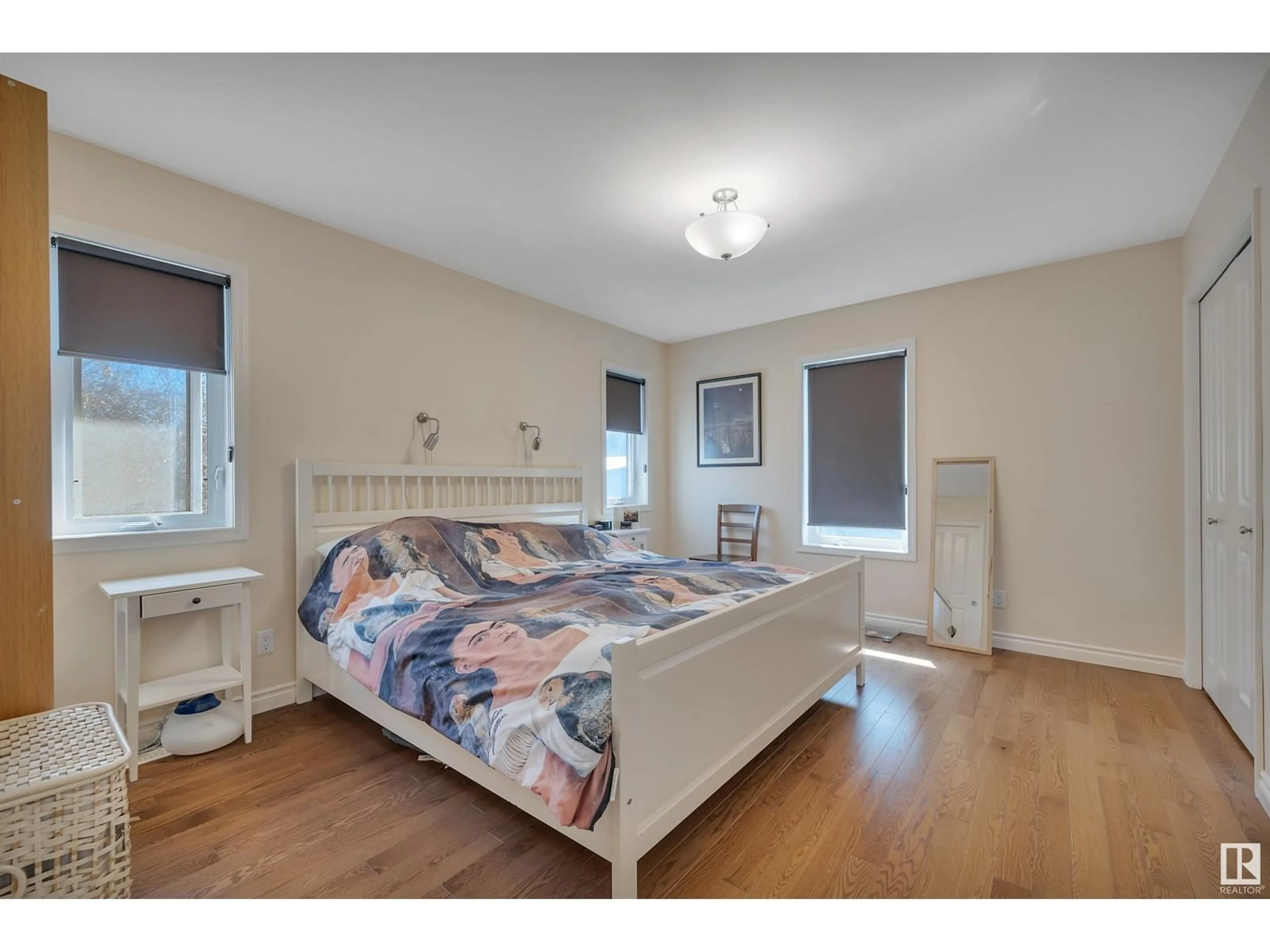 Bedroom with bed, wood/laminate floor for 49045 RGE ROAD 271, Rural Leduc County Alberta T0C0B7