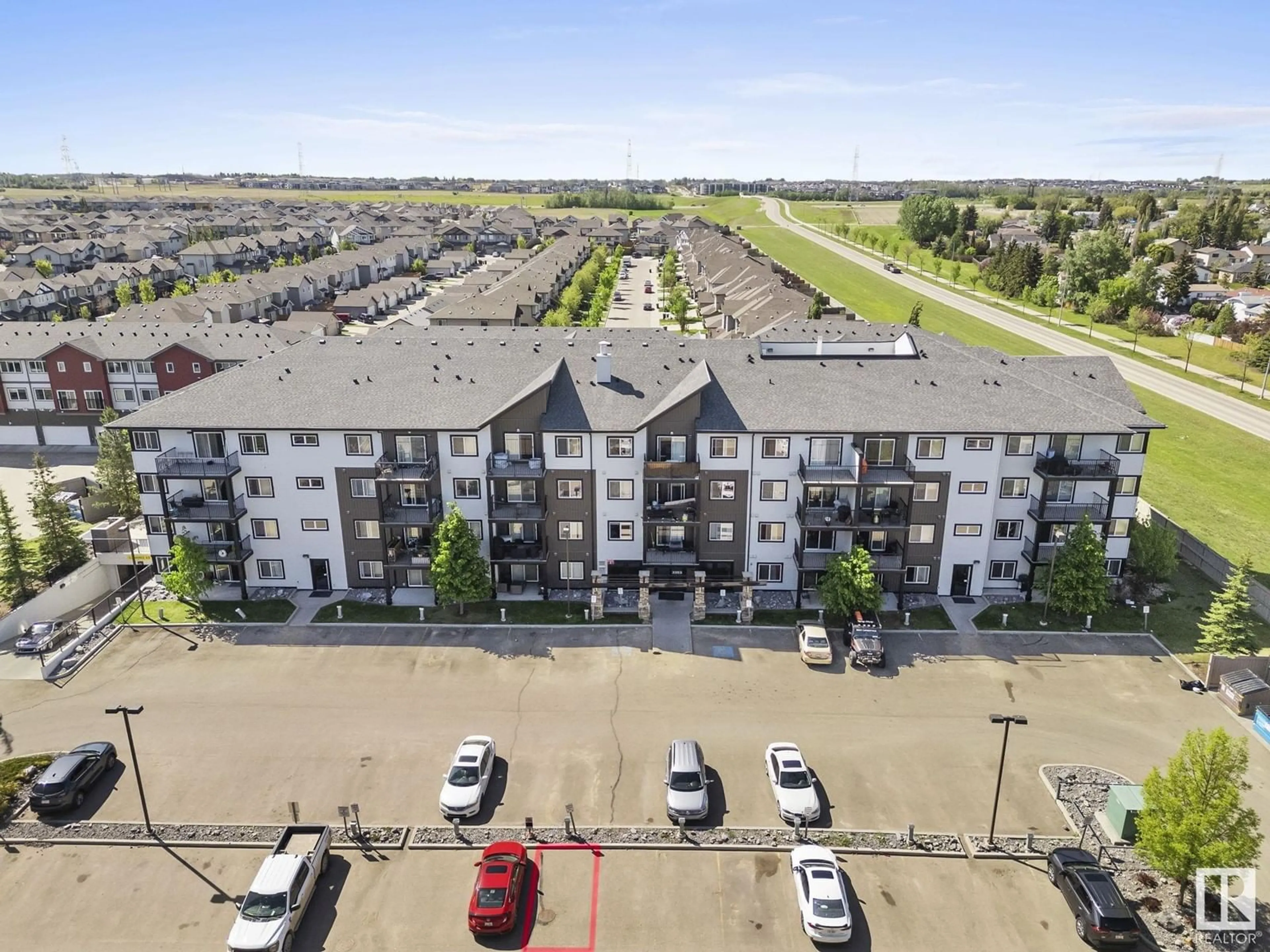 A pic from outside/outdoor area/front of a property/back of a property/a pic from drone, unknown for #306 - 3353 16A AV, Edmonton Alberta T6T0V4