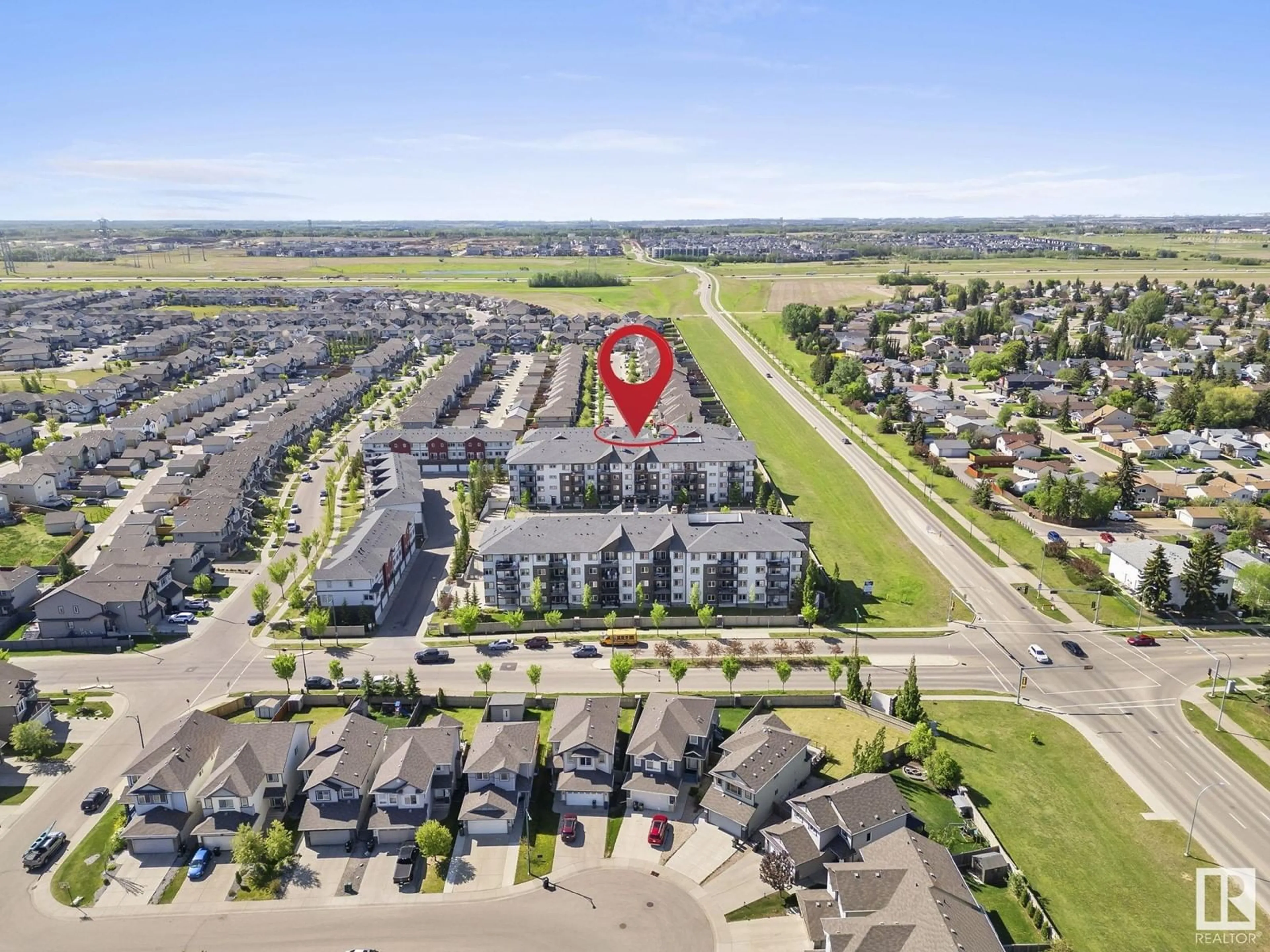 A pic from outside/outdoor area/front of a property/back of a property/a pic from drone, unknown for #306 - 3353 16A AV, Edmonton Alberta T6T0V4