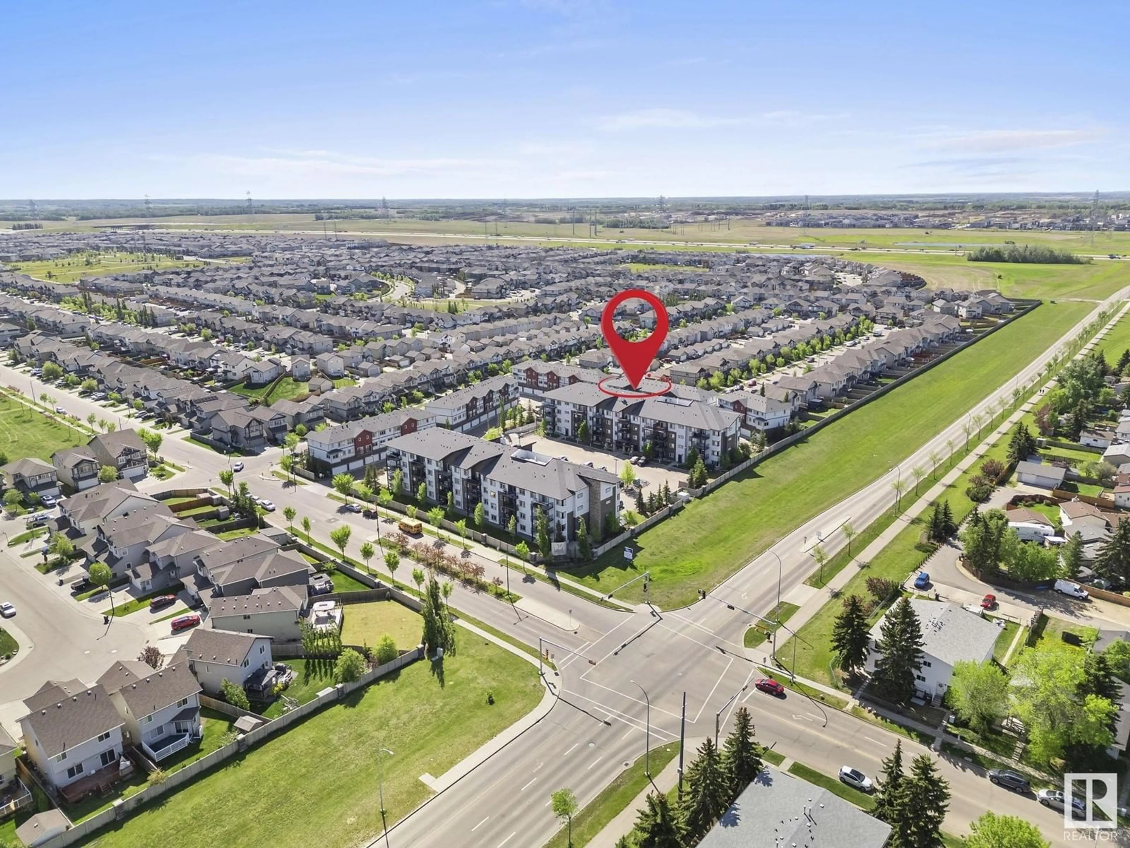 A pic from outside/outdoor area/front of a property/back of a property/a pic from drone, unknown for #306 - 3353 16A AV, Edmonton Alberta T6T0V4
