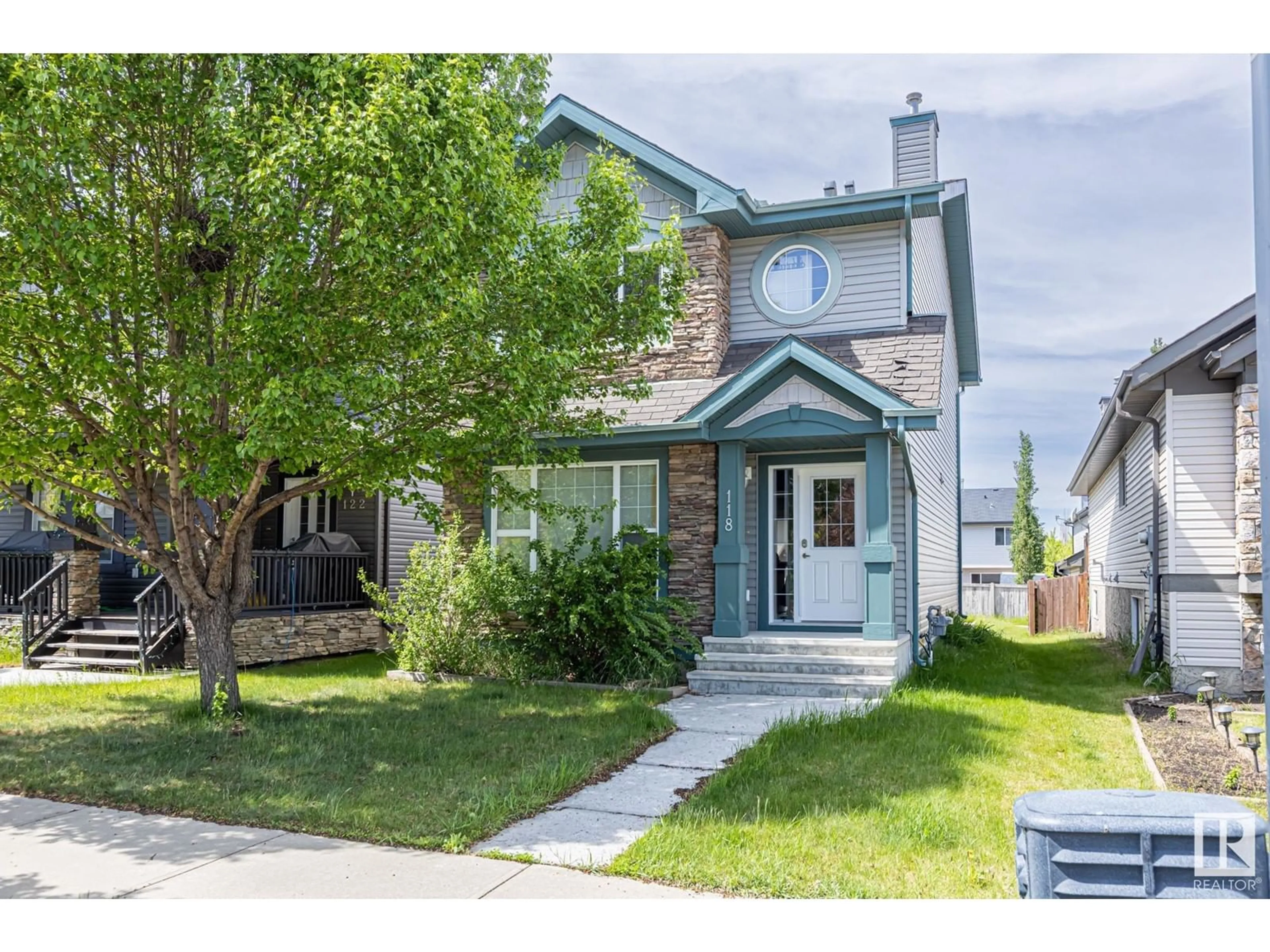 Home with vinyl exterior material, street for SW - 118 63 ST, Edmonton Alberta T6X0C1