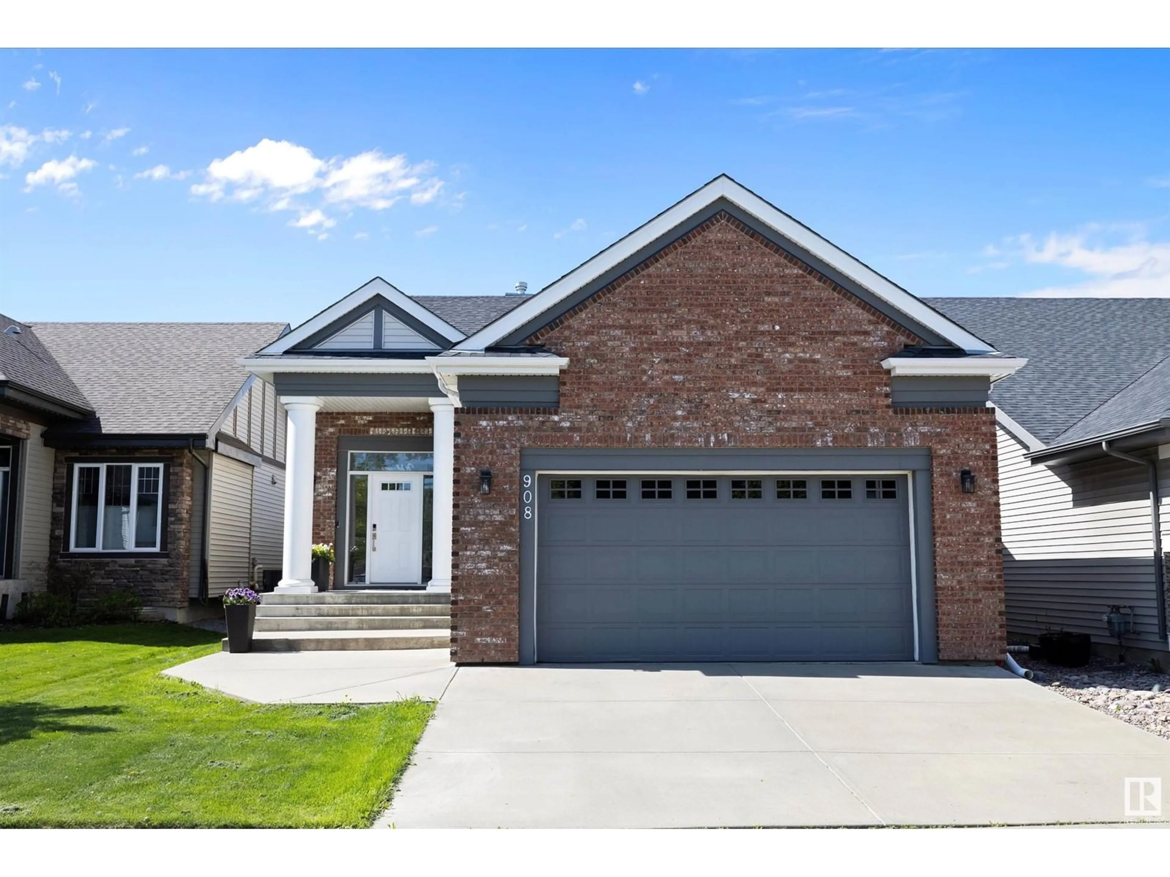 Home with brick exterior material, street for 908 CHAHLEY CR, Edmonton Alberta T6M0C7