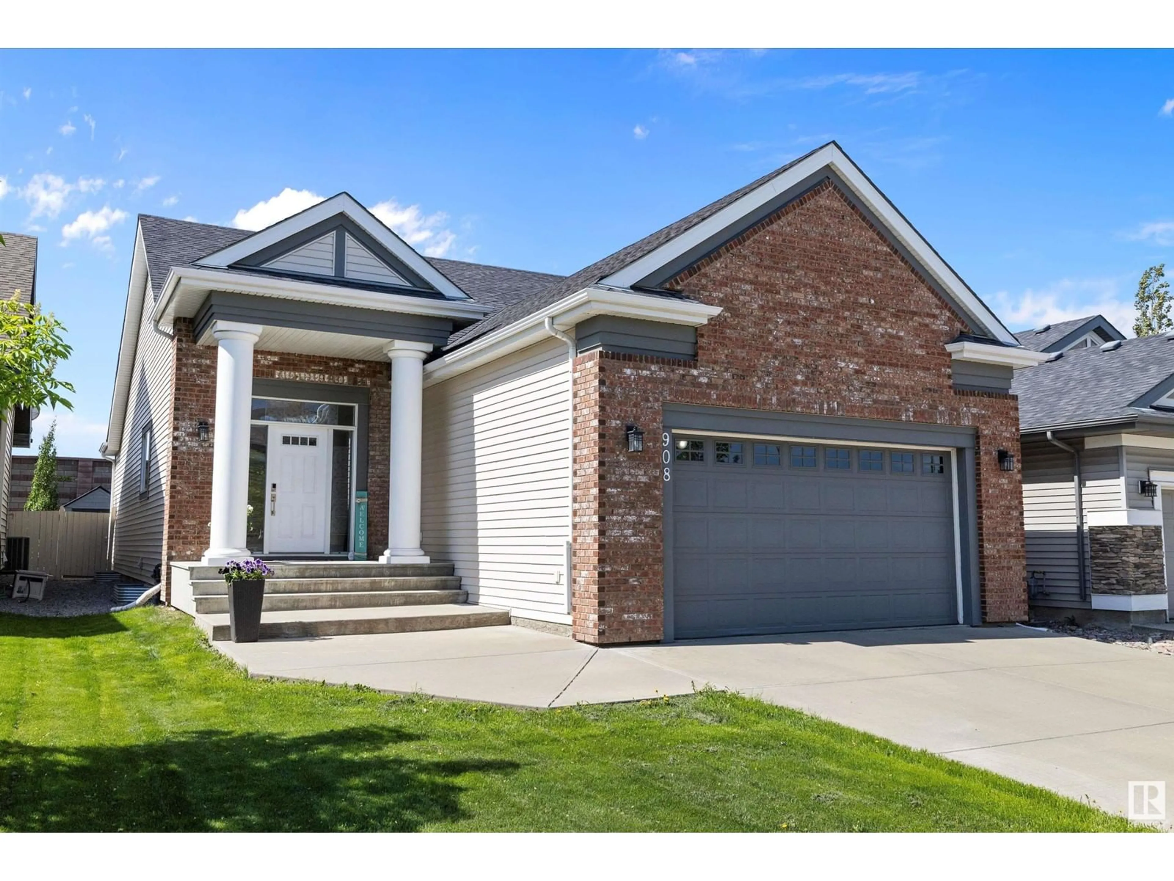 Home with brick exterior material, street for 908 CHAHLEY CR, Edmonton Alberta T6M0C7