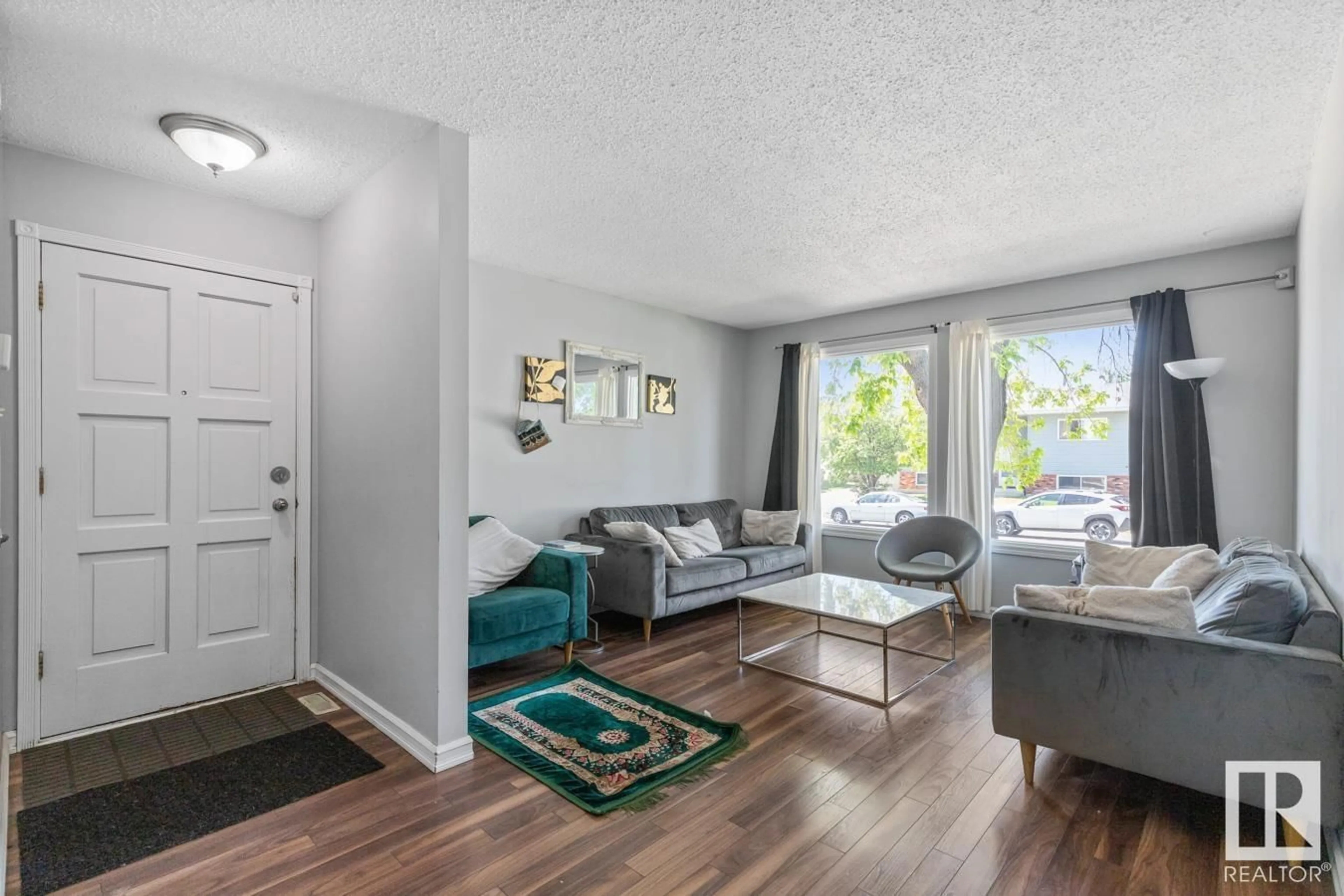 Living room with furniture, unknown for 17211 102 ST, Edmonton Alberta T5X3X5
