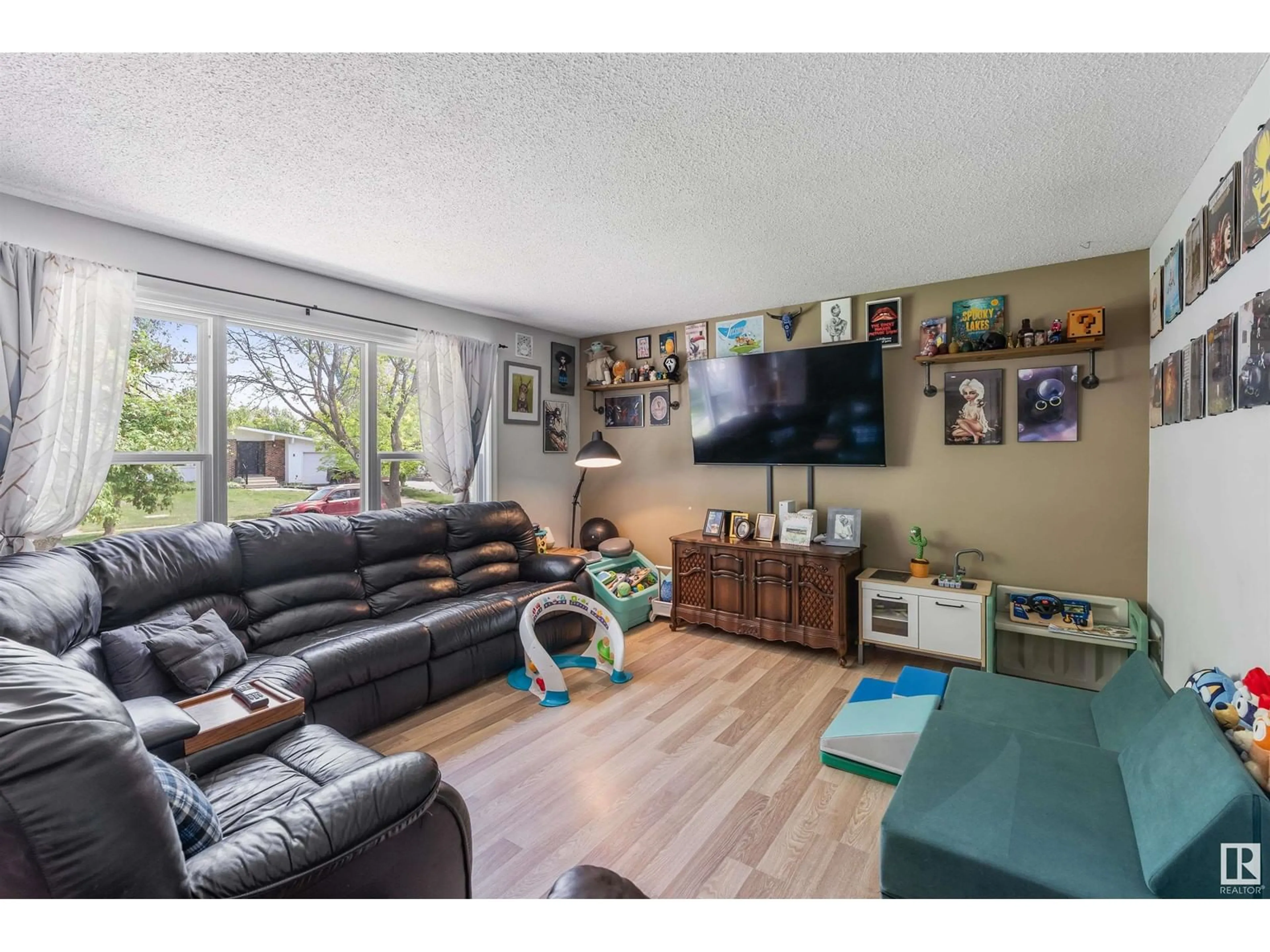 Living room with furniture, wood/laminate floor for 7 AMBER CR, St. Albert Alberta T8N2J2
