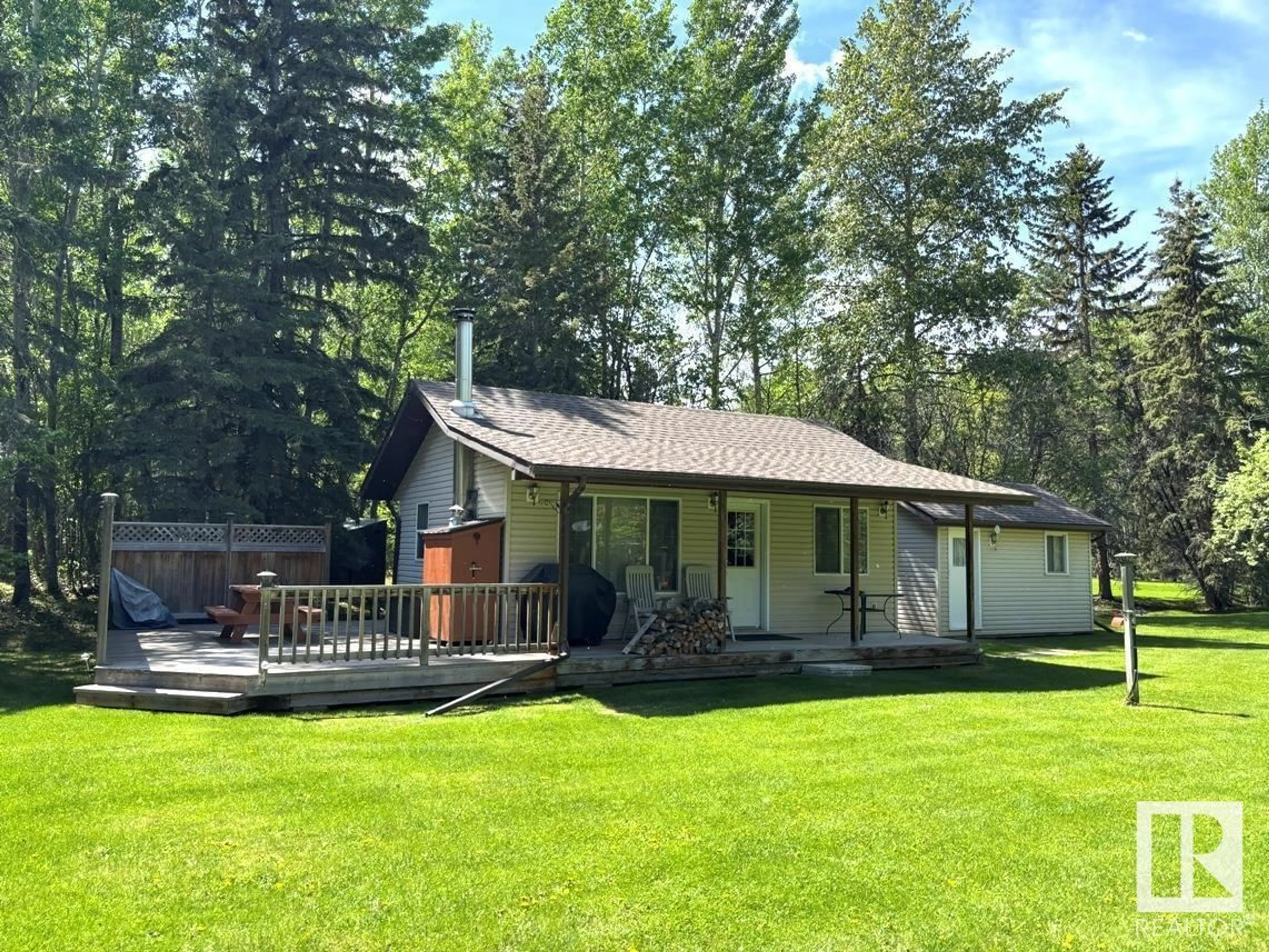 A pic from outside/outdoor area/front of a property/back of a property/a pic from drone, unknown for 82 RGE ROAD 63, Rural Wetaskiwin County Alberta T0C0T0