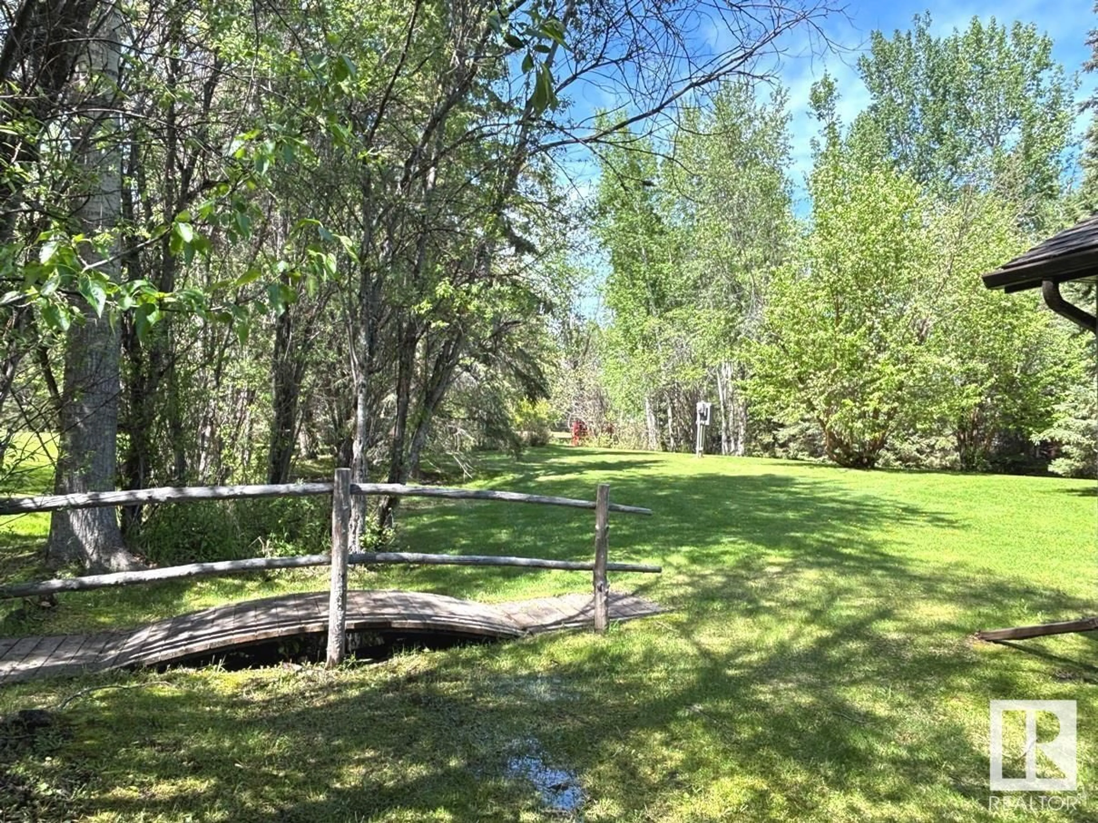 A pic from outside/outdoor area/front of a property/back of a property/a pic from drone, forest/trees view for 82 RGE ROAD 63, Rural Wetaskiwin County Alberta T0C0T0
