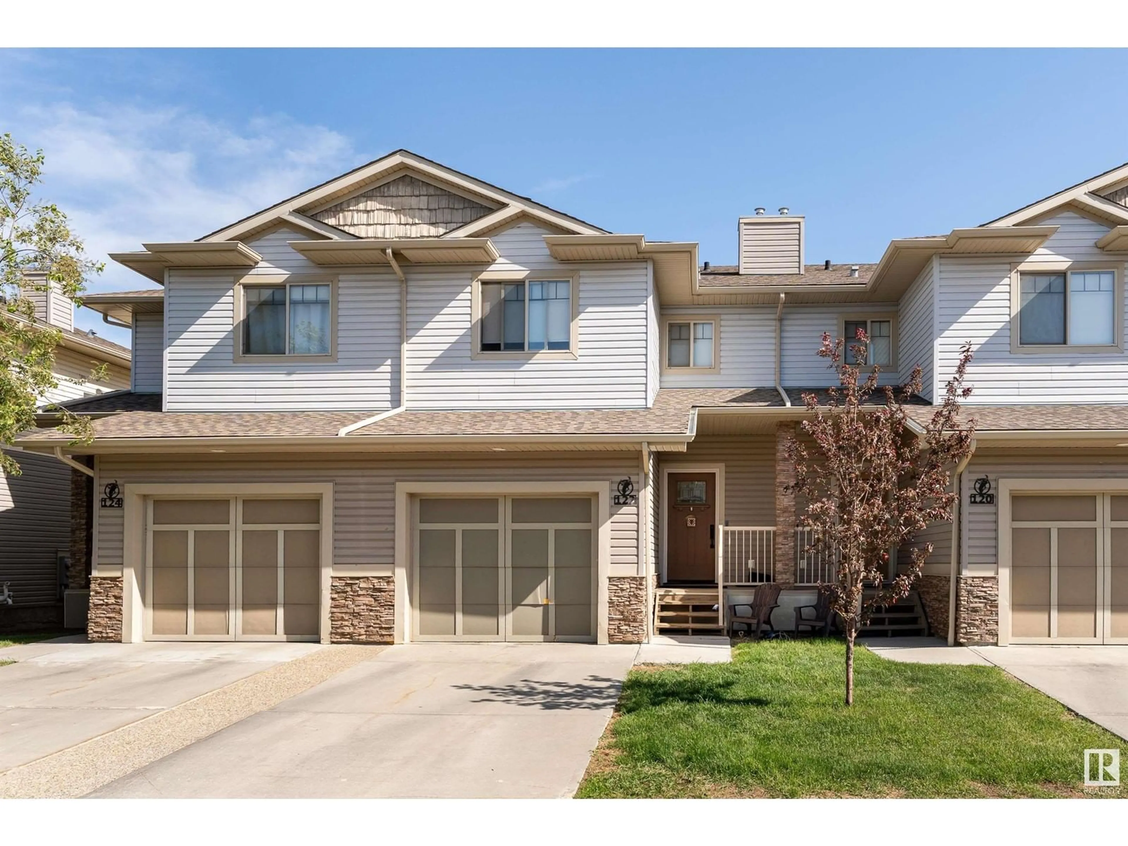 Home with vinyl exterior material, street for #122 - 5420 GRANT MACEWAN BV, Leduc Alberta T9E0M1