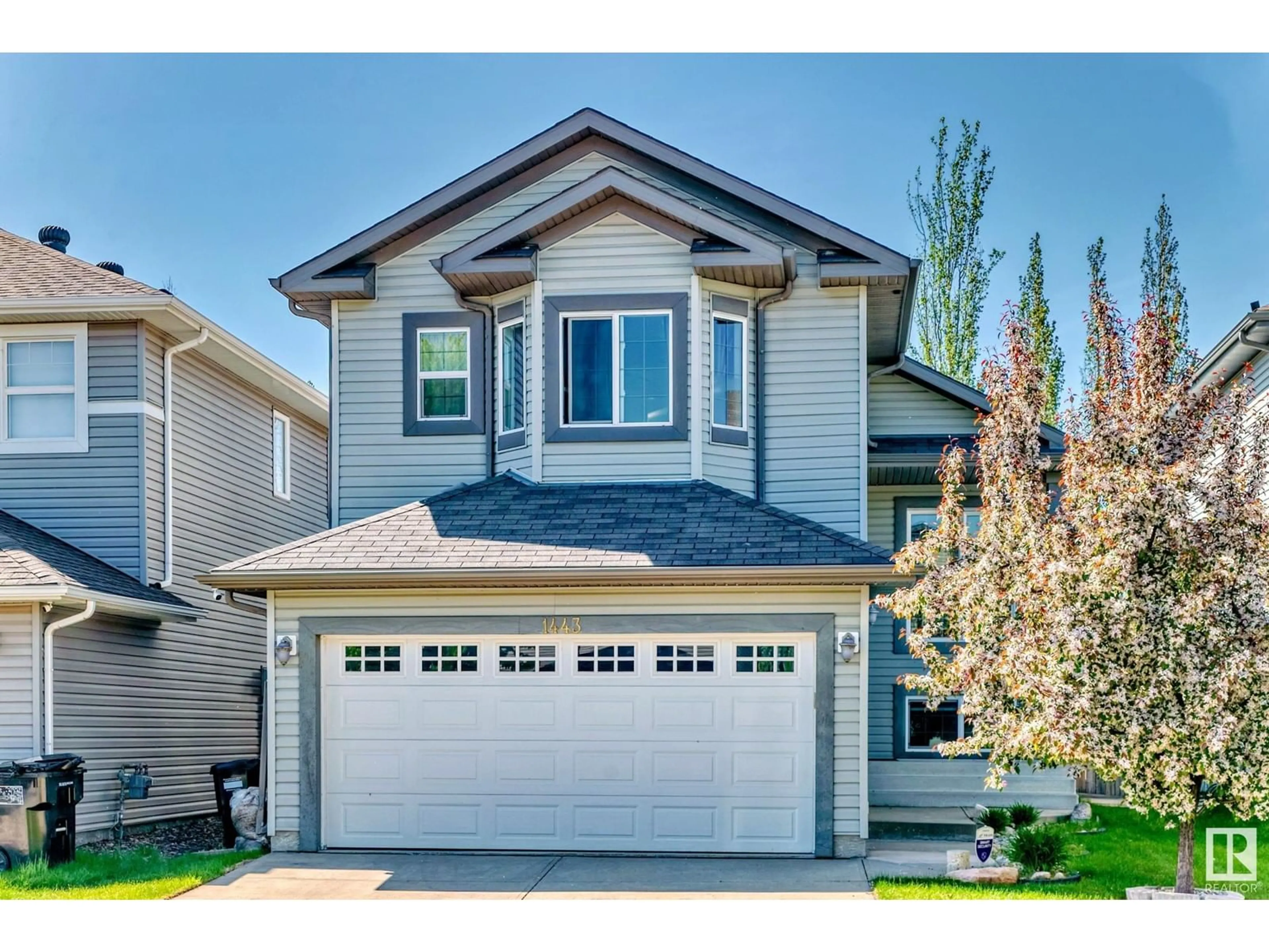 Home with vinyl exterior material, street for 1443 37C AV AV, Edmonton Alberta T6T0H8