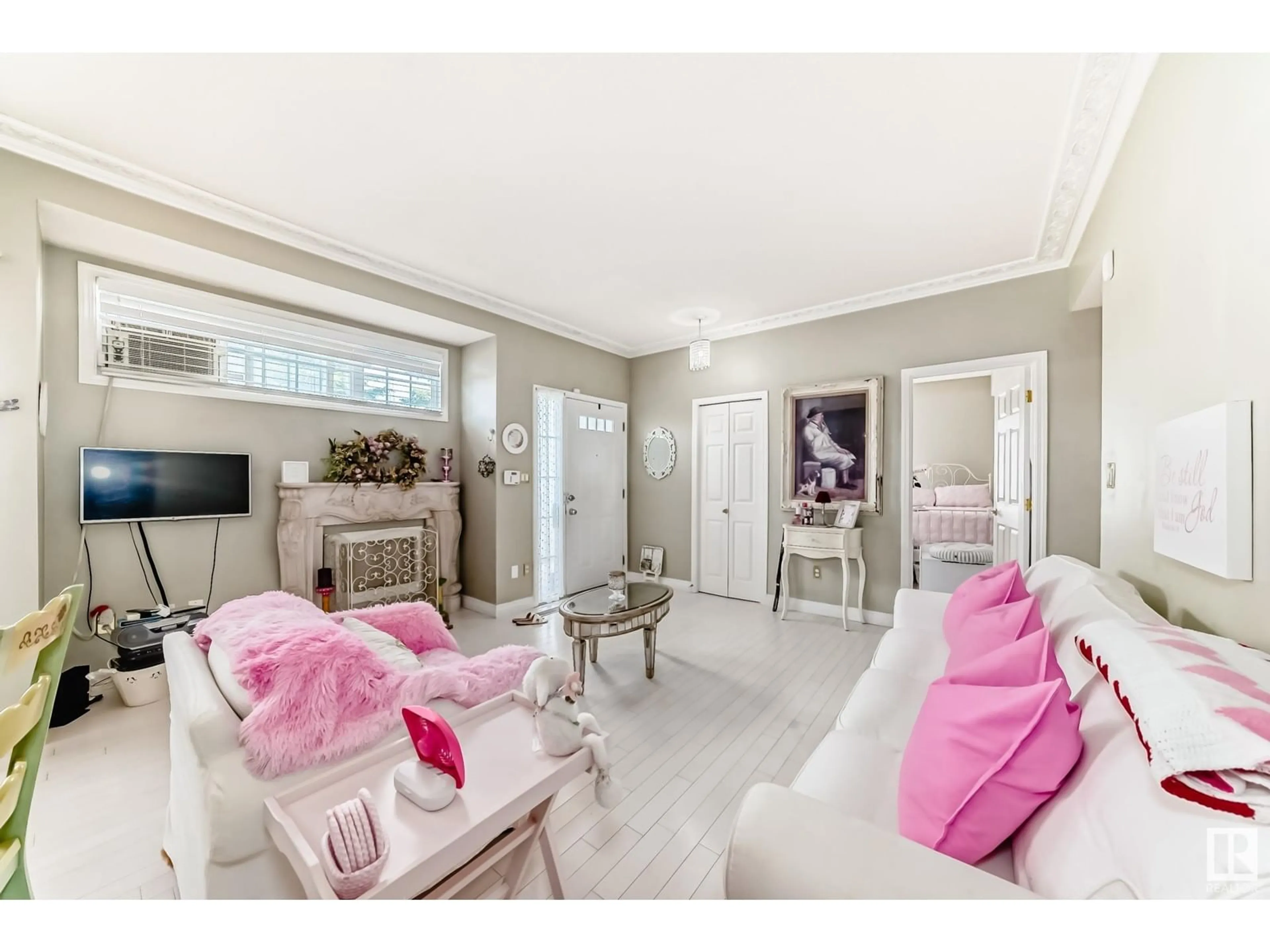 Living room with furniture, unknown for SW - 32 1179 SUMMERSIDE DR, Edmonton Alberta T5K1K1
