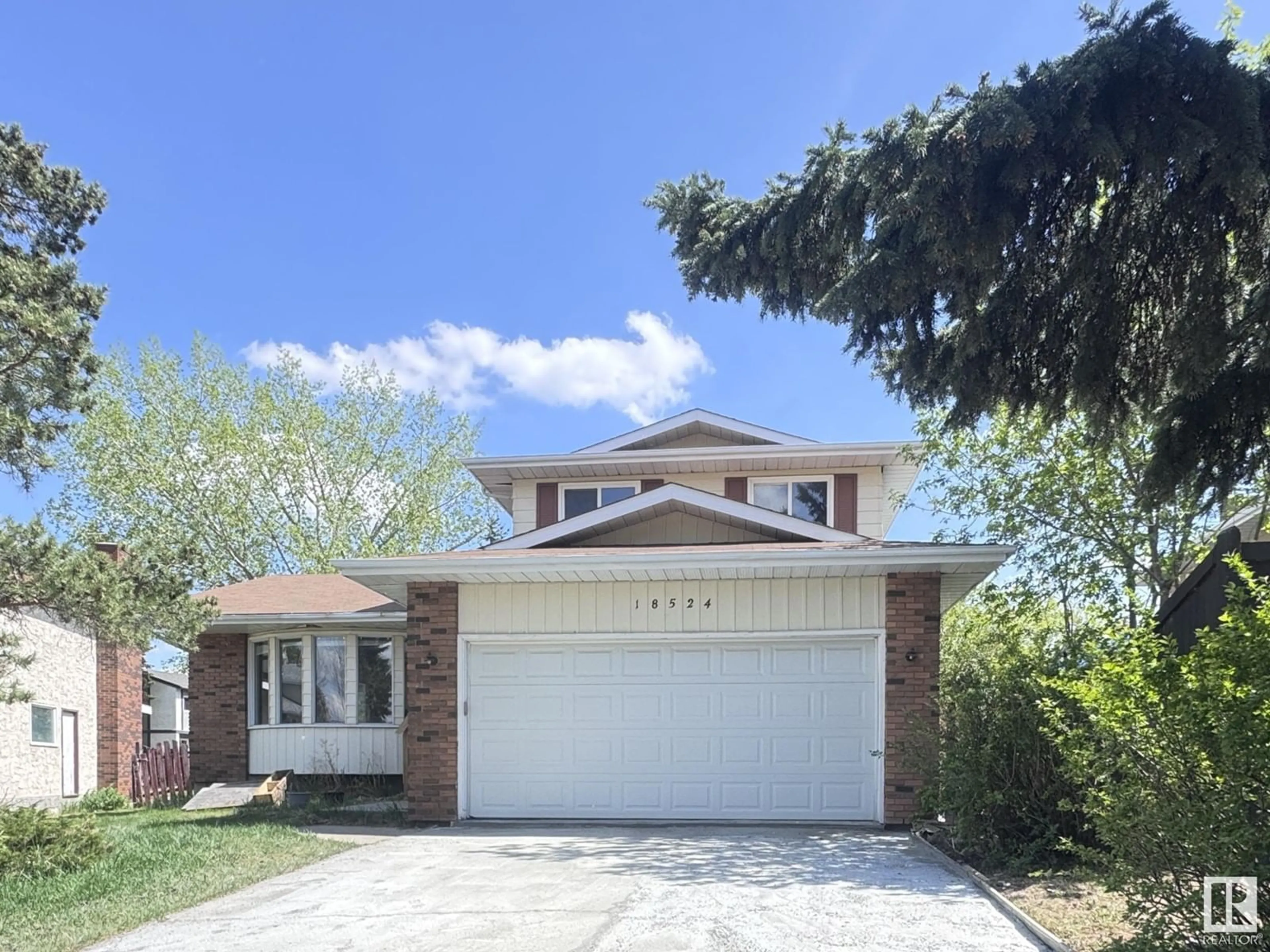 Home with vinyl exterior material, street for NW - 18524 62B AV, Edmonton Alberta T5T2N7