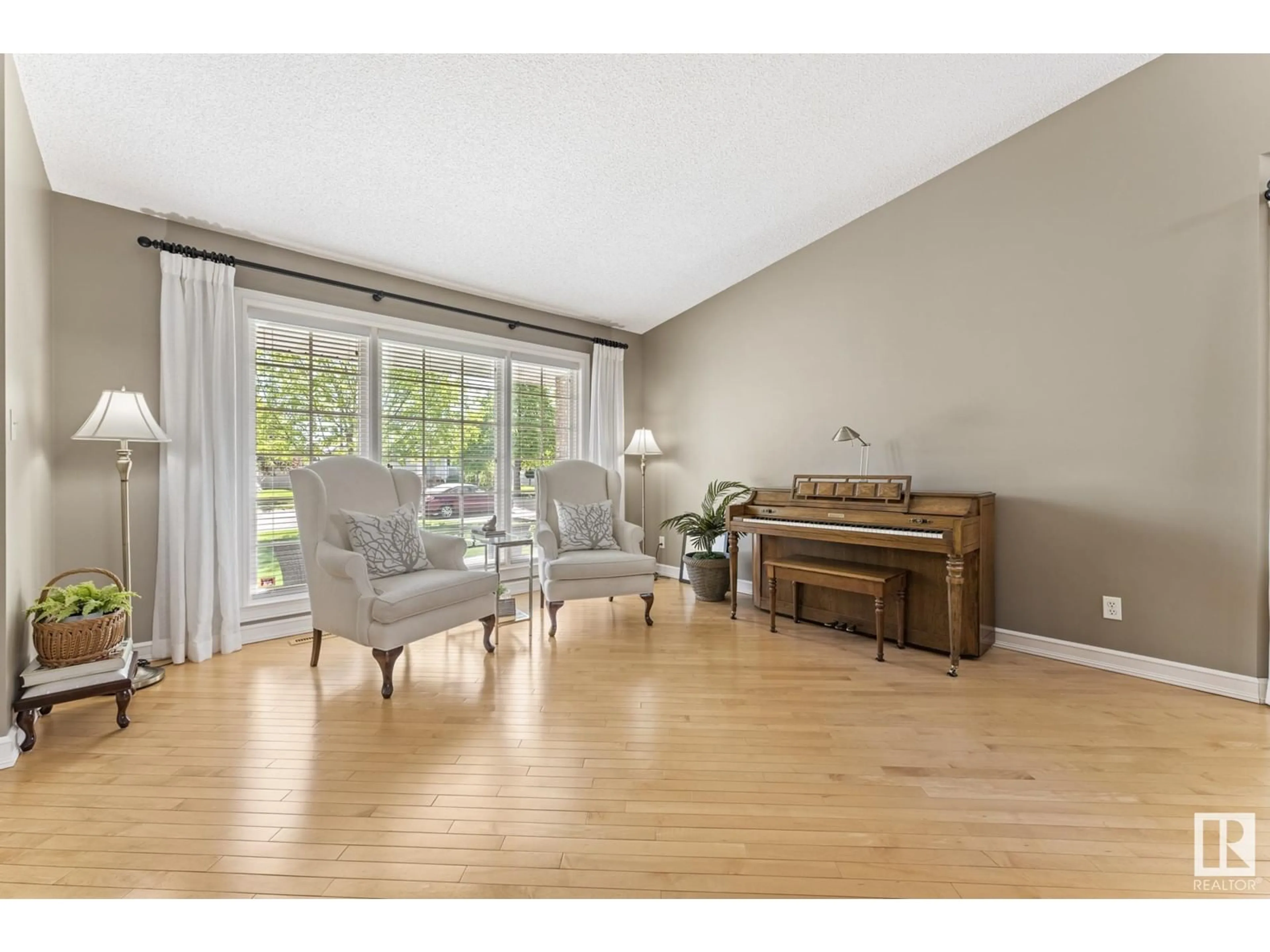 Living room with furniture, wood/laminate floor for 54 RIDGEMONT CR, Sherwood Park Alberta T8A5N1