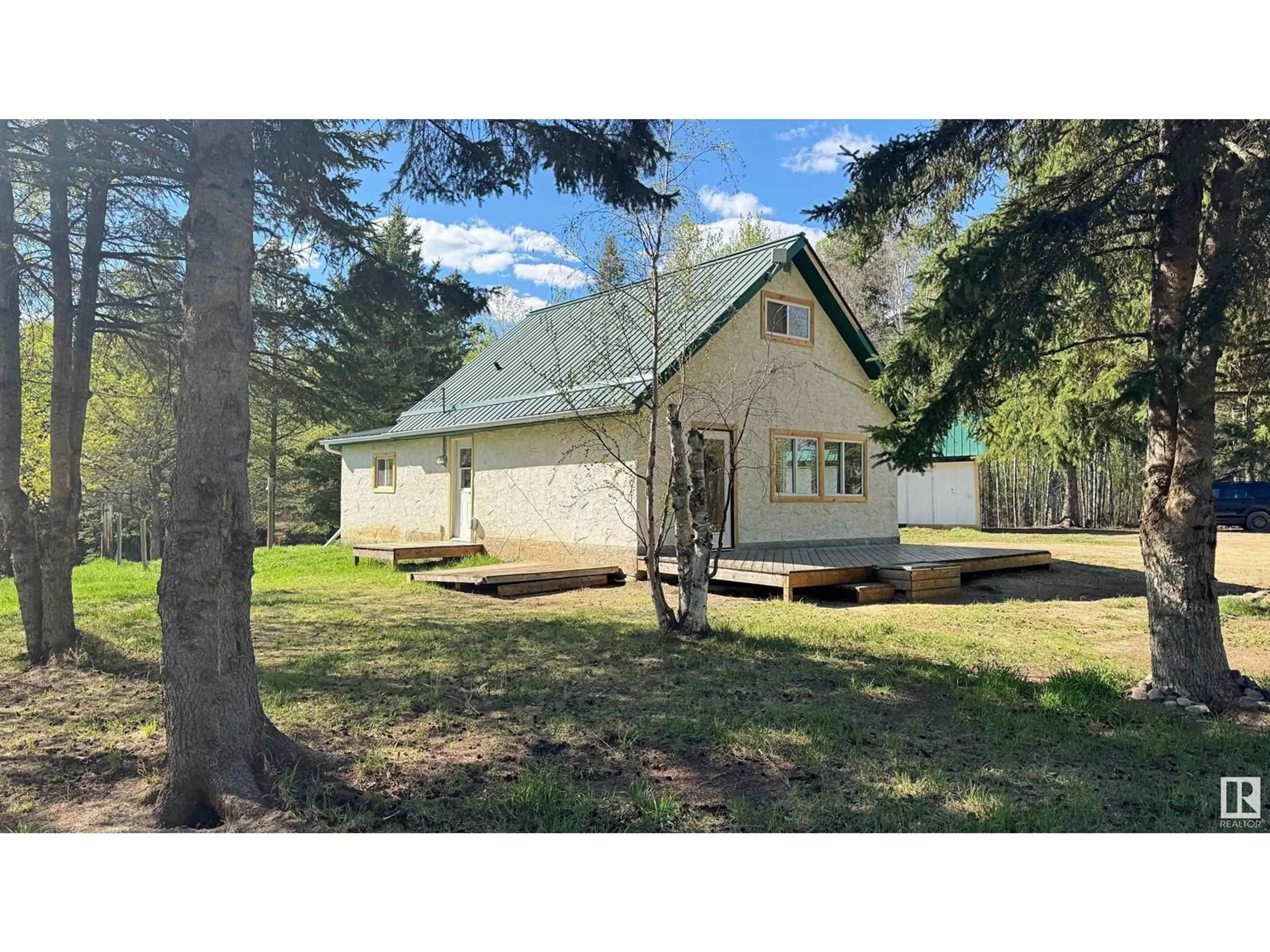 A pic from outside/outdoor area/front of a property/back of a property/a pic from drone, unknown for 620076B HWY 661, Rural Woodlands County Alberta T0G1A0