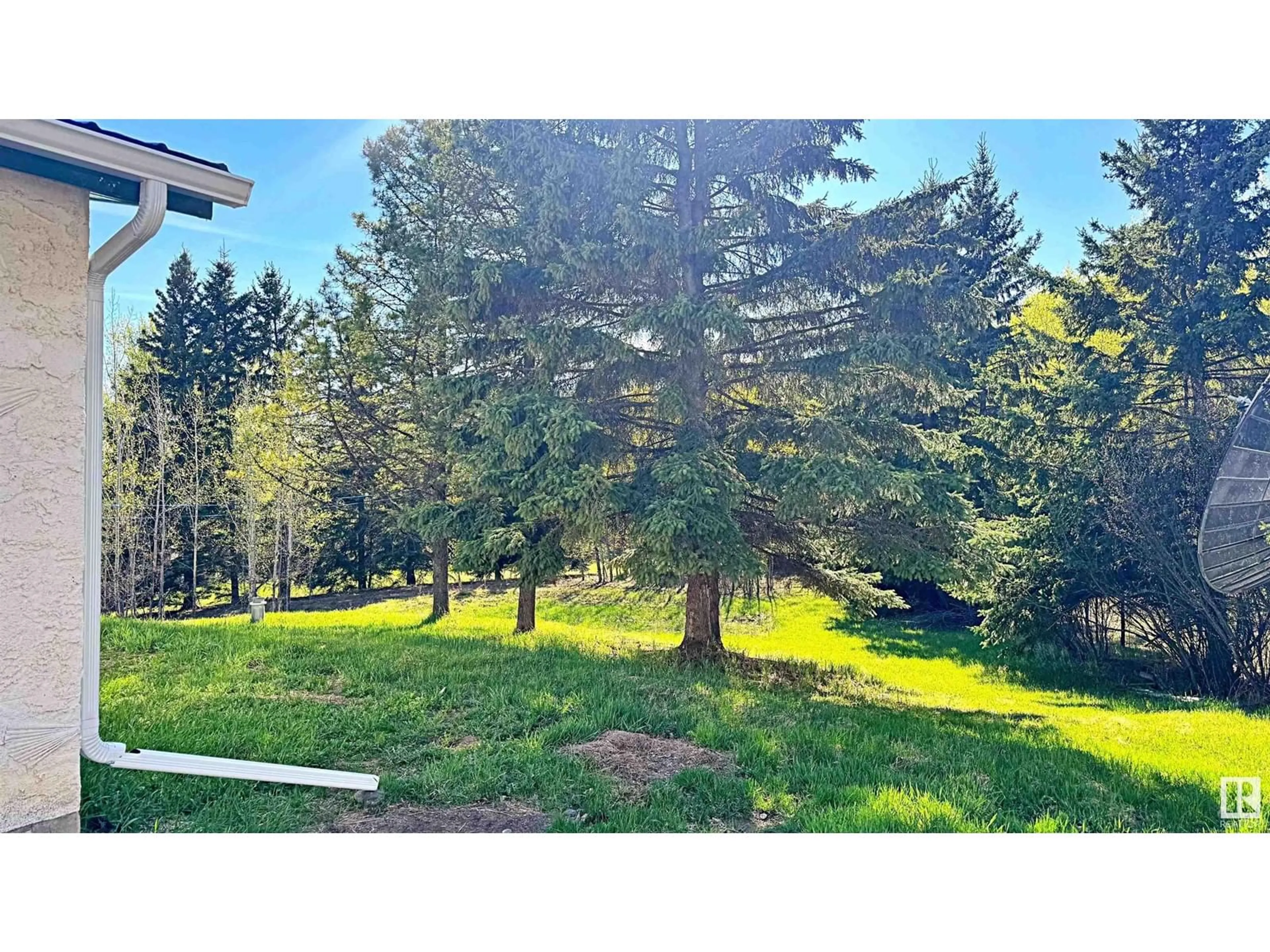 A pic from outside/outdoor area/front of a property/back of a property/a pic from drone, forest/trees view for 620076B HWY 661, Rural Woodlands County Alberta T0G1A0