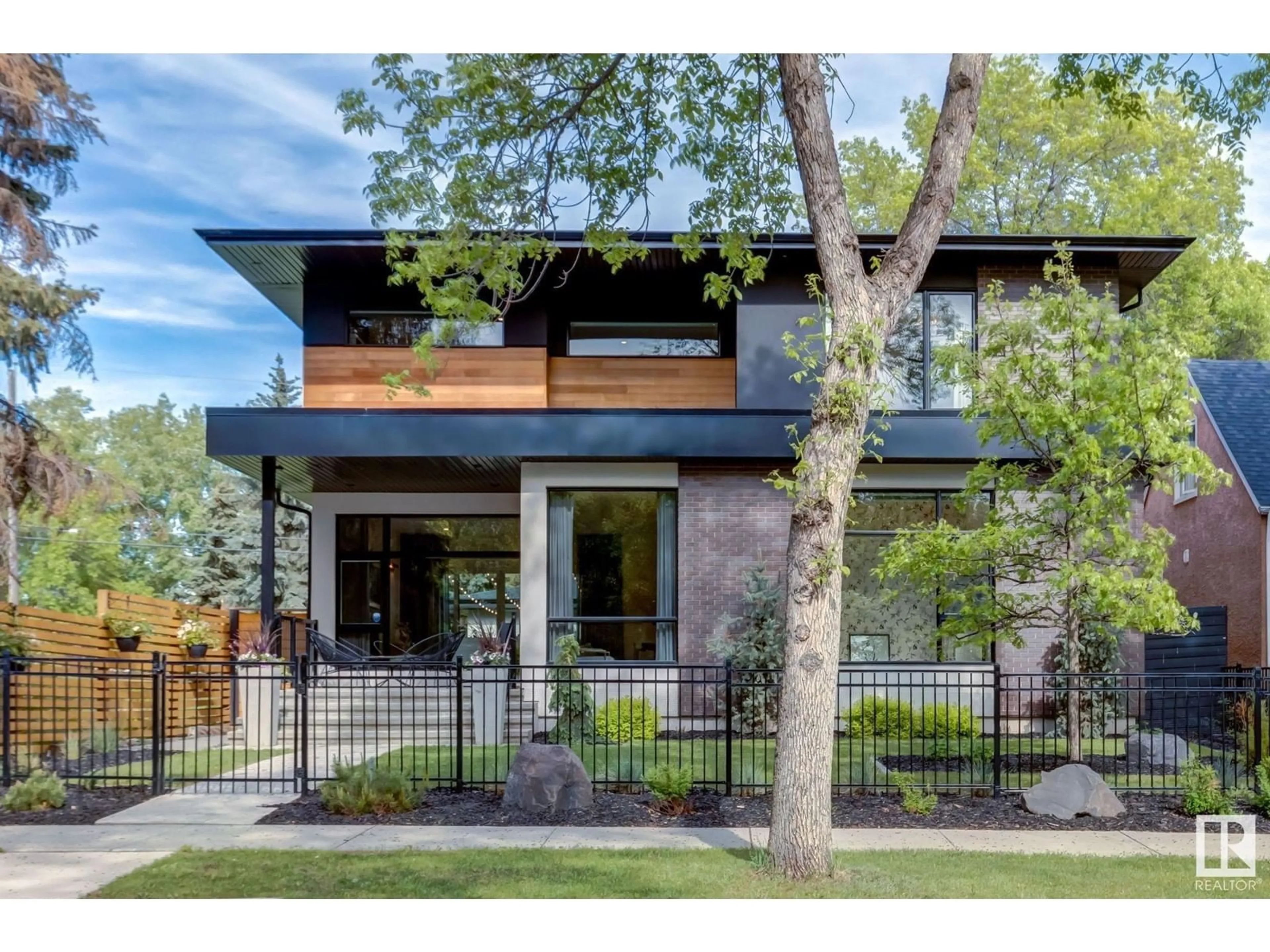 Home with brick exterior material, street for 10979 122 ST, Edmonton Alberta T5M0A9