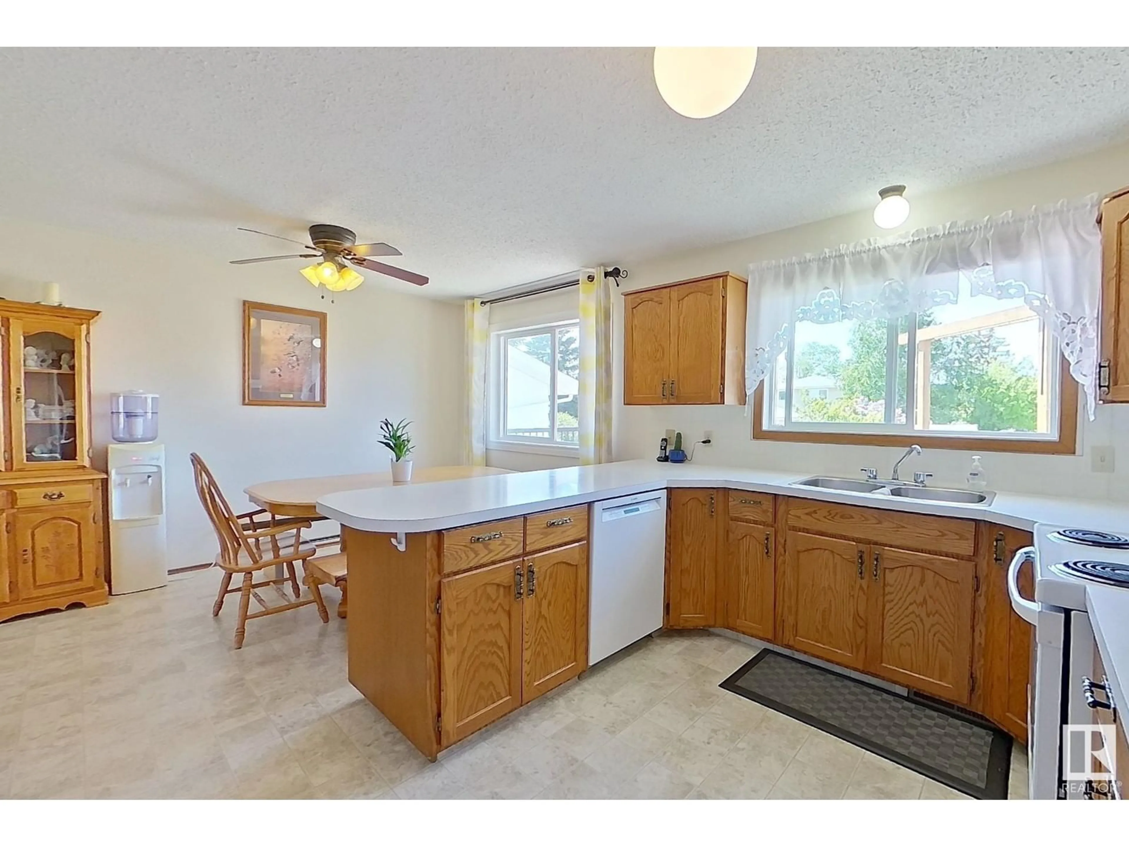 Open concept kitchen, ceramic/tile floor for 10707 108 A AV, Westlock Alberta T7P1C5