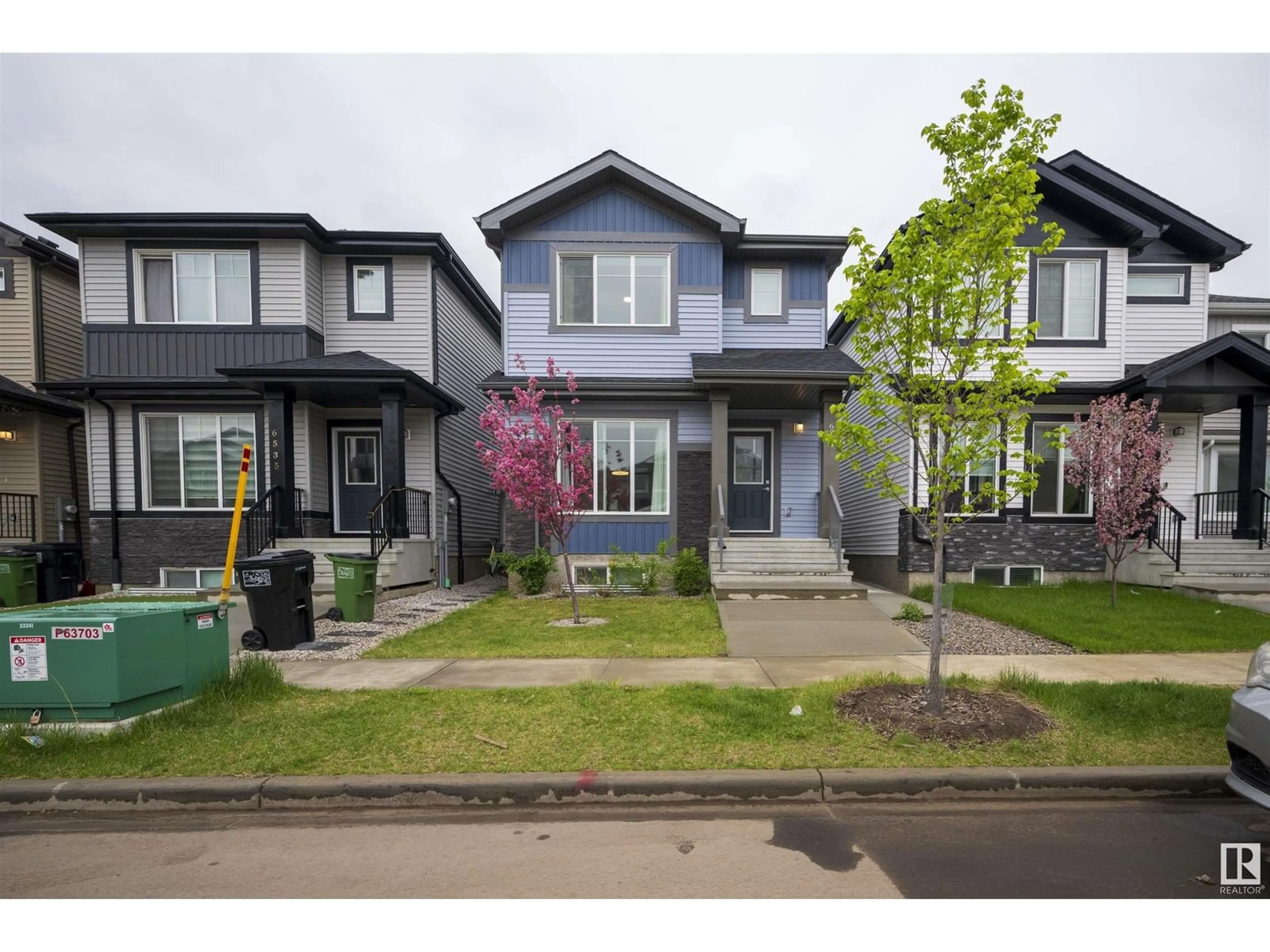 A pic from outside/outdoor area/front of a property/back of a property/a pic from drone, street for 6539 176 AV, Edmonton Alberta T5Y4B2